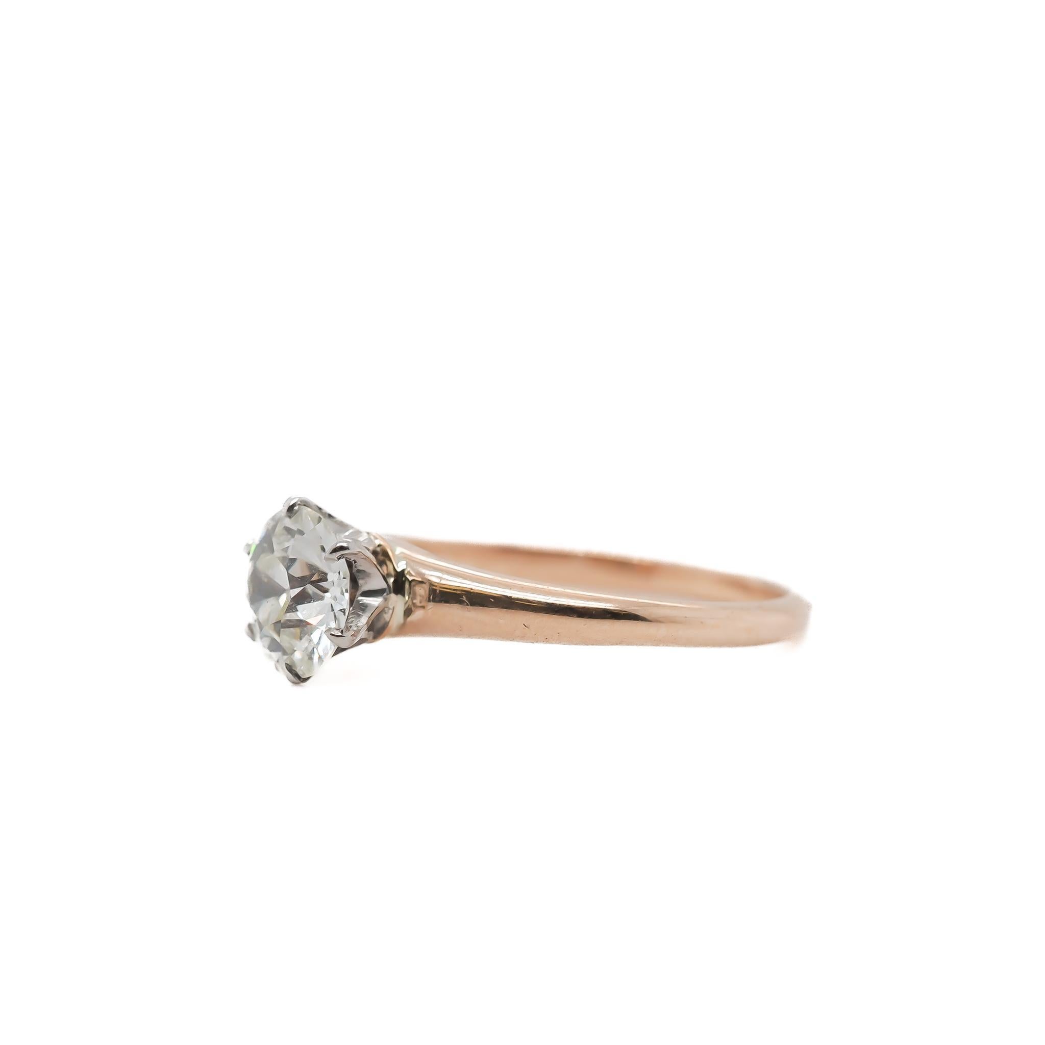 Year: 1920s

Item Details:
Ring Size: 6.25
Metal Type: 14K Yellow Gold & Platinum [Hallmarked, and Tested]
Weight: 1.8 grams

Center Diamond Details:

GIA Report#: 1232444047
Weight: .71ct total weight
Cut: Old European brilliant
Color: K
Clarity: