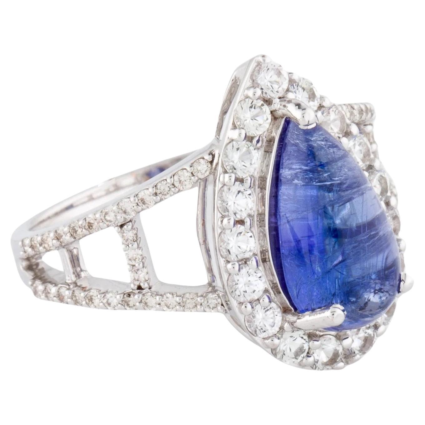 Cockta de oro blanco rodiado de 14 quilates con tanzanita, zafiro de 0,59 ct y diamante de 0,15 ct