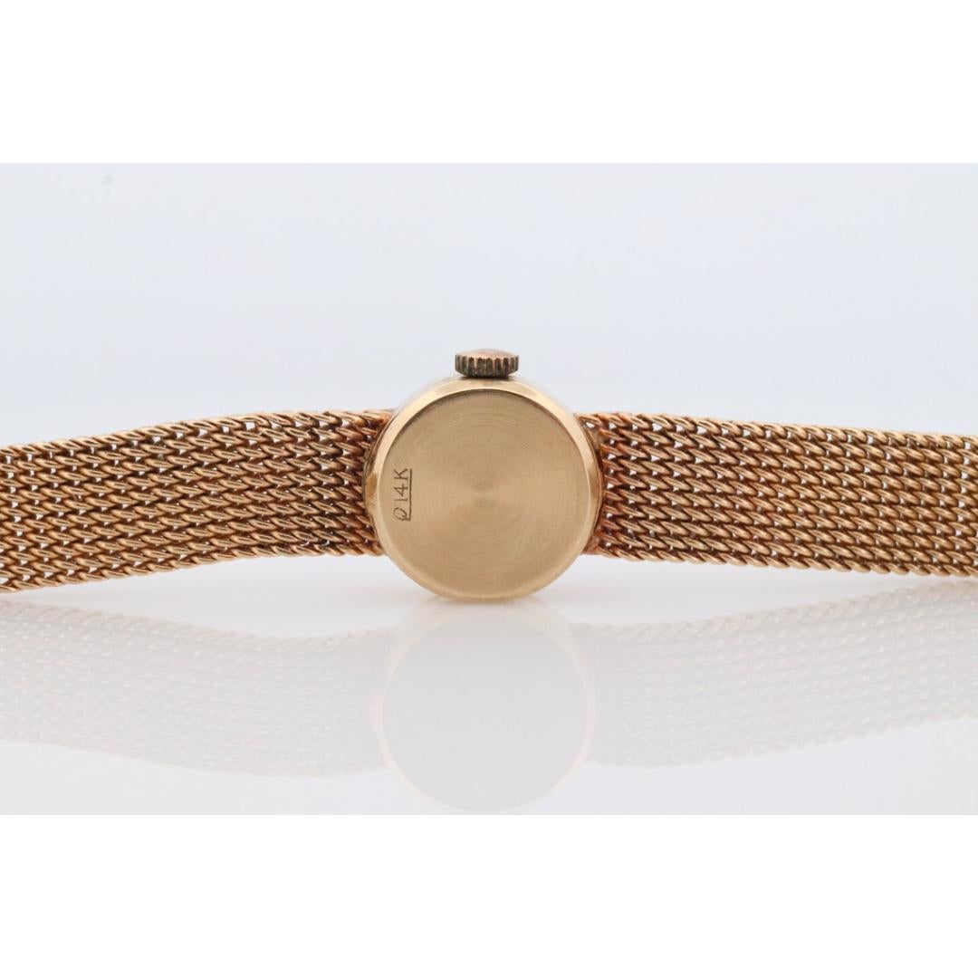 14k Rolex Damen-Cocktailuhr. 14k Orchidee Rolex mit Gelbgoldarmband. 1