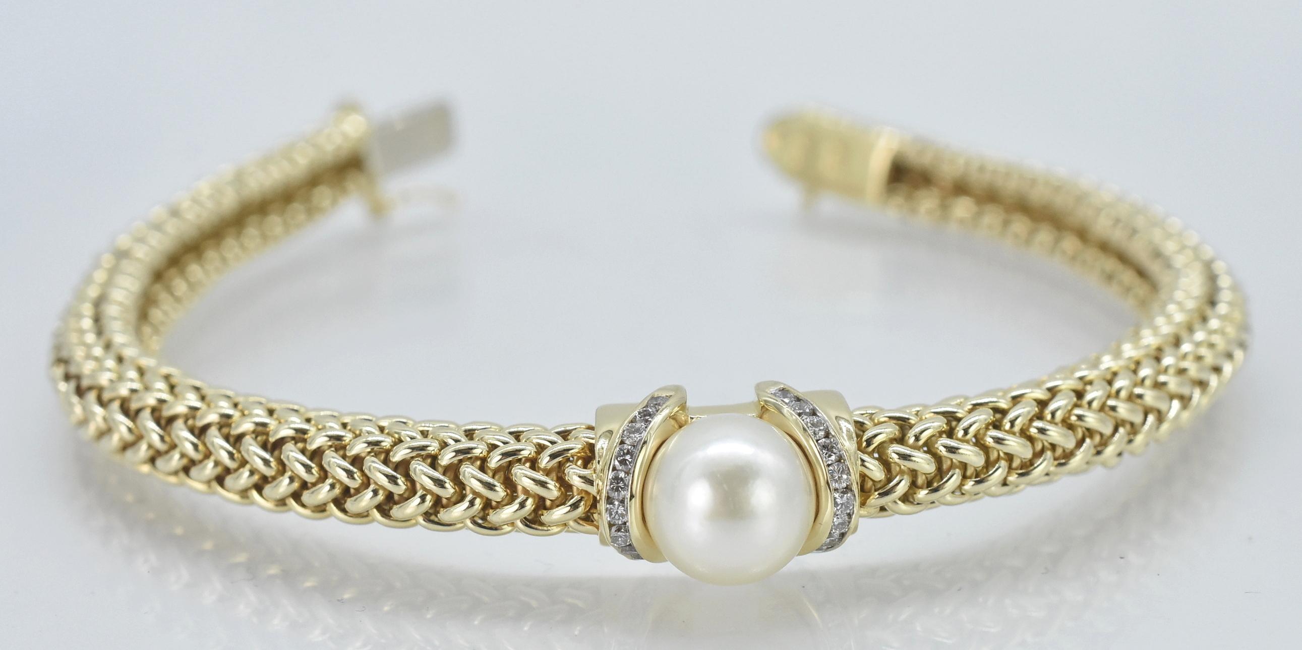 14K Rope Design Bracelet with Pearl, SKD, Scott Keating Design. Scott Keating Design, 14K yellow gold round rope design bracelet, with central pearl and .25 cttw round cut diamond accents. 7 1/4