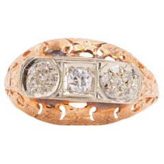 Anello con diamante d'epoca in oro rosa e bianco 14 carati