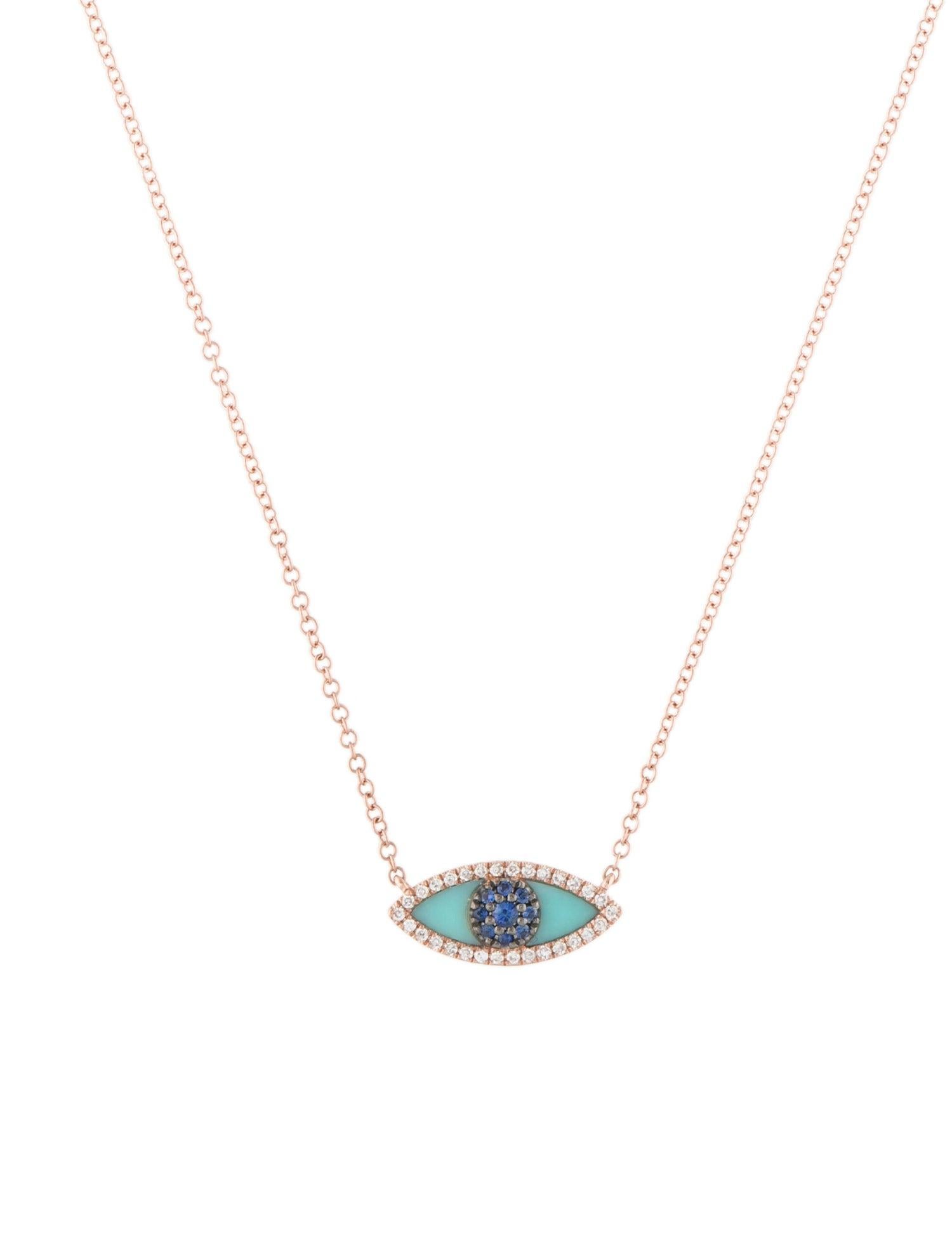 This striking Evil Eye Necklace crafted of 14K Gold features Luscious Blue Sapphires which trace the outline of a Turquoise eye, with white diamonds ensuring that the gaze won't waver. Diamond Weight is approximately 0.08ct ans Sapphire weight is