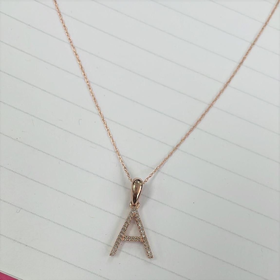 Alphabet Initial Pendant Necklace: Beautiful gold necklace perfectly sized at 16-18 inches in chain length an initial diameter 13mm featuring round diamonds between 0.09 ct - 0.12, allowing you to show off your name, new last name or alma mater.
