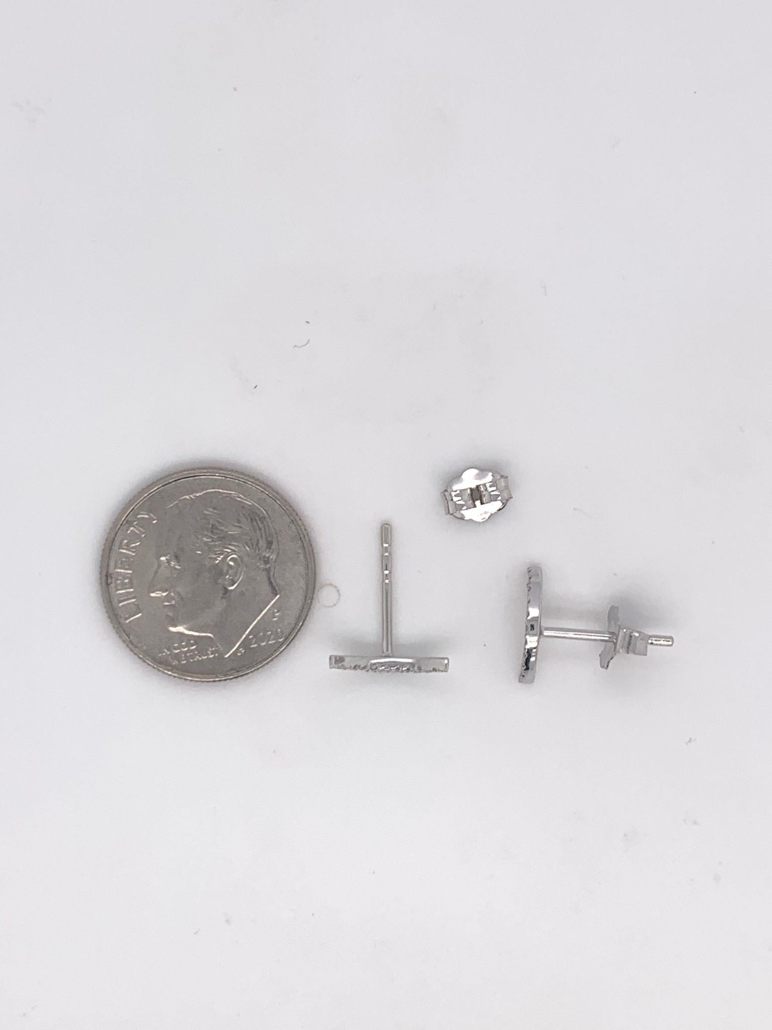 Pretty and classic diamond moon Studs earrings featuring approximately 0.12ct of genuine white diamonds crafted of 14k gold. Secured with butterfly backs.  Diamond color and Clarity GH SI1-SI2 
-14K Gold
-0.12cts White Diamonds
-Diamond Color