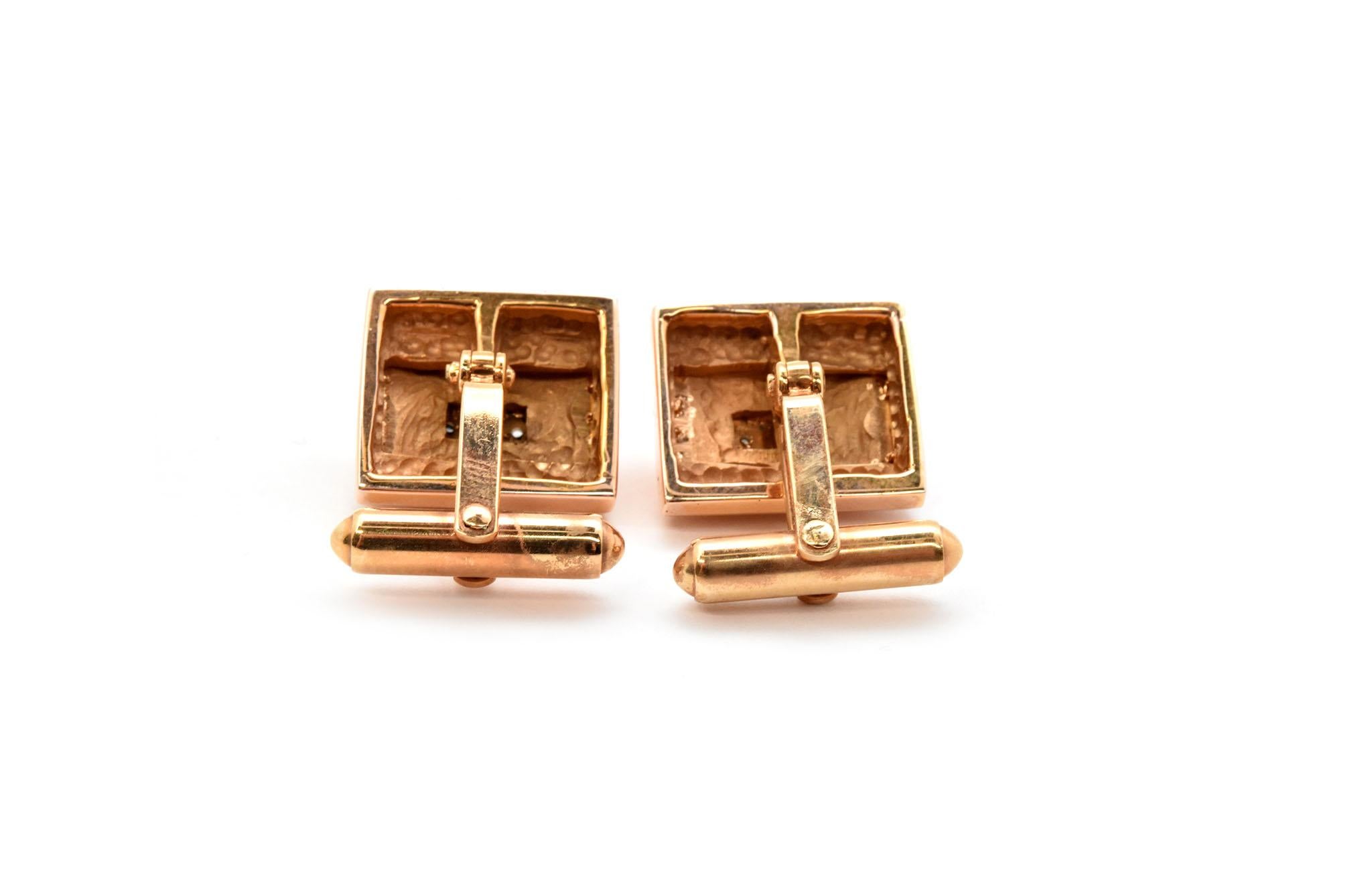 Each cufflink is made in 14k rose gold and set with 2 round brilliant diamonds with a combined weight of 0.18cttw. Each cufflink has a hinged attachment to make them more flexible to the wearer’s cuff. Each rectangular cufflink measures