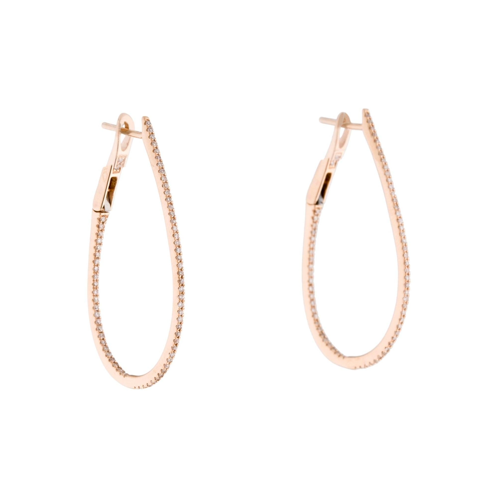 Set your lobes aglow in the classic shimmer and shine of these luxurious pear shape skinny hoop earrings! A dazzling array of diamonds fire up and down the design crafted from 14k white, yellow or rose gold. Lever backs offer easy application so you