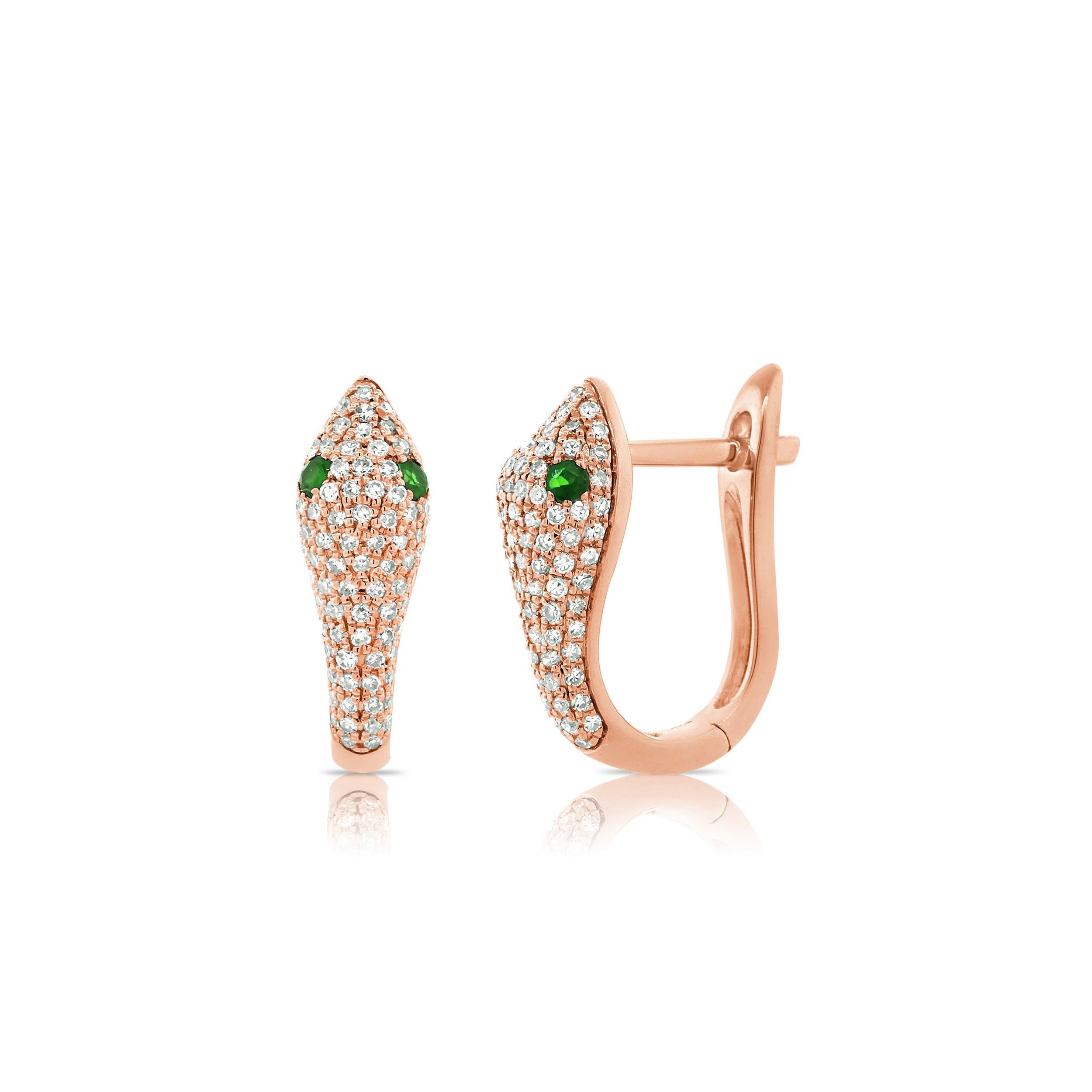 These Stylish and Chic Snake Earrings are crafted of 14K Gold featuring approximately 0.46 cts of round Diamonds & 2 Tsavorite weighing 0.14cts Secured with Hinged backs.
-14K Gold
-0.46cts Natural White Diamonds
-0.14cts Tsavorite
-Diamond Color