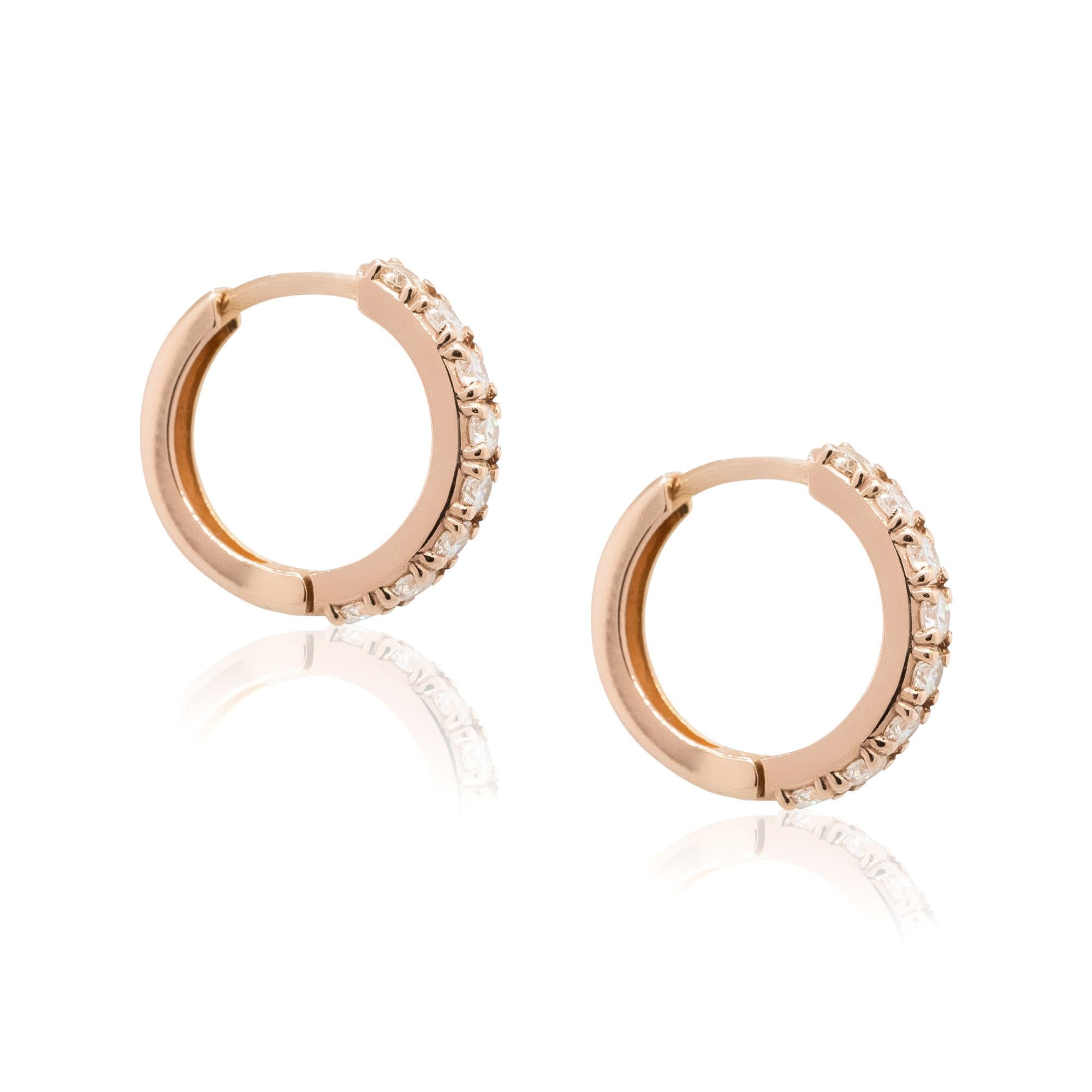 14k Rose Gold 0.66ctw Diamond Huggie Earrings
These 14k Rose Gold 0.66ctw Diamond Huggie Earrings are a charming and elegant accessory for any occasion. Crafted in lustrous rose gold, these huggie-style earrings are adorned with a total of 0.66