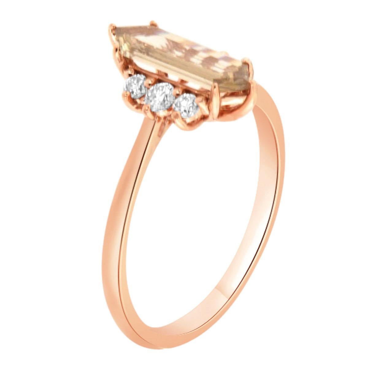 This 14k Rose gold rustic ring features a 0.73 Carat Hexagonal faceted brilliant light champagne color Natural Diamond flanked by six (6) brilliant round diamonds on top of a 1.6 MM wide band. 
The total diamond weight on the ring is 0.17-Carat.
