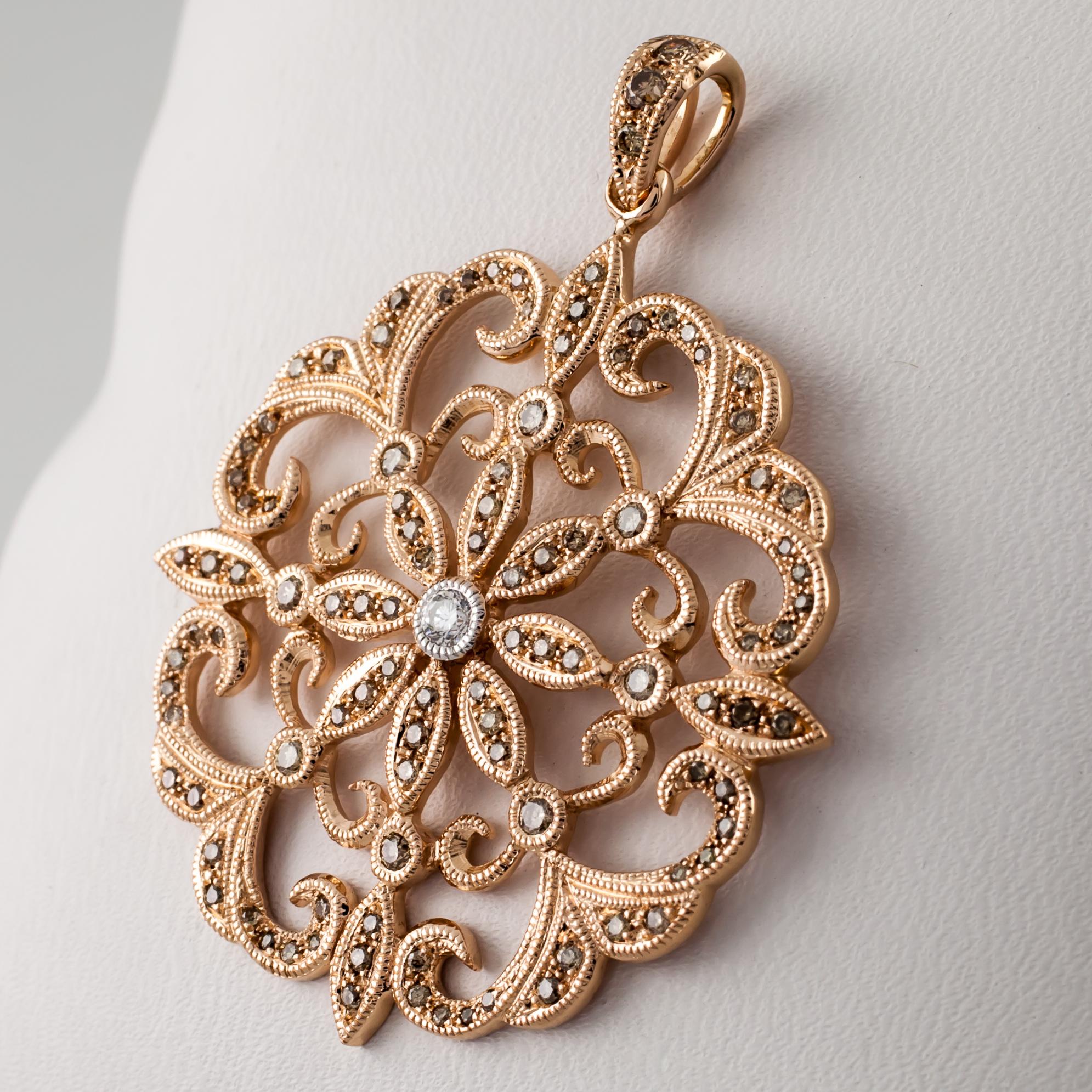 Gorgeous Floral Pendant
14k Rose Gold
Total Diamond Weight = 1.00 carat 
Total Mass = 6.4 grams
Size of pendant = 1.5 inches  x 1.25 inches