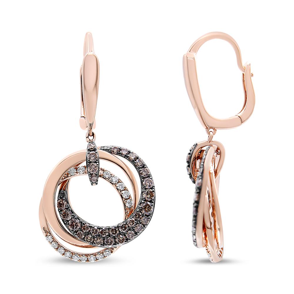 Designed in a contemporary style are the stunning triple circle diamond earrings in 14k rose gold. Each piece seamless symphony of three hoops coming together like a spectacular magic show. One hoop features resplendent rose gold, another hoop