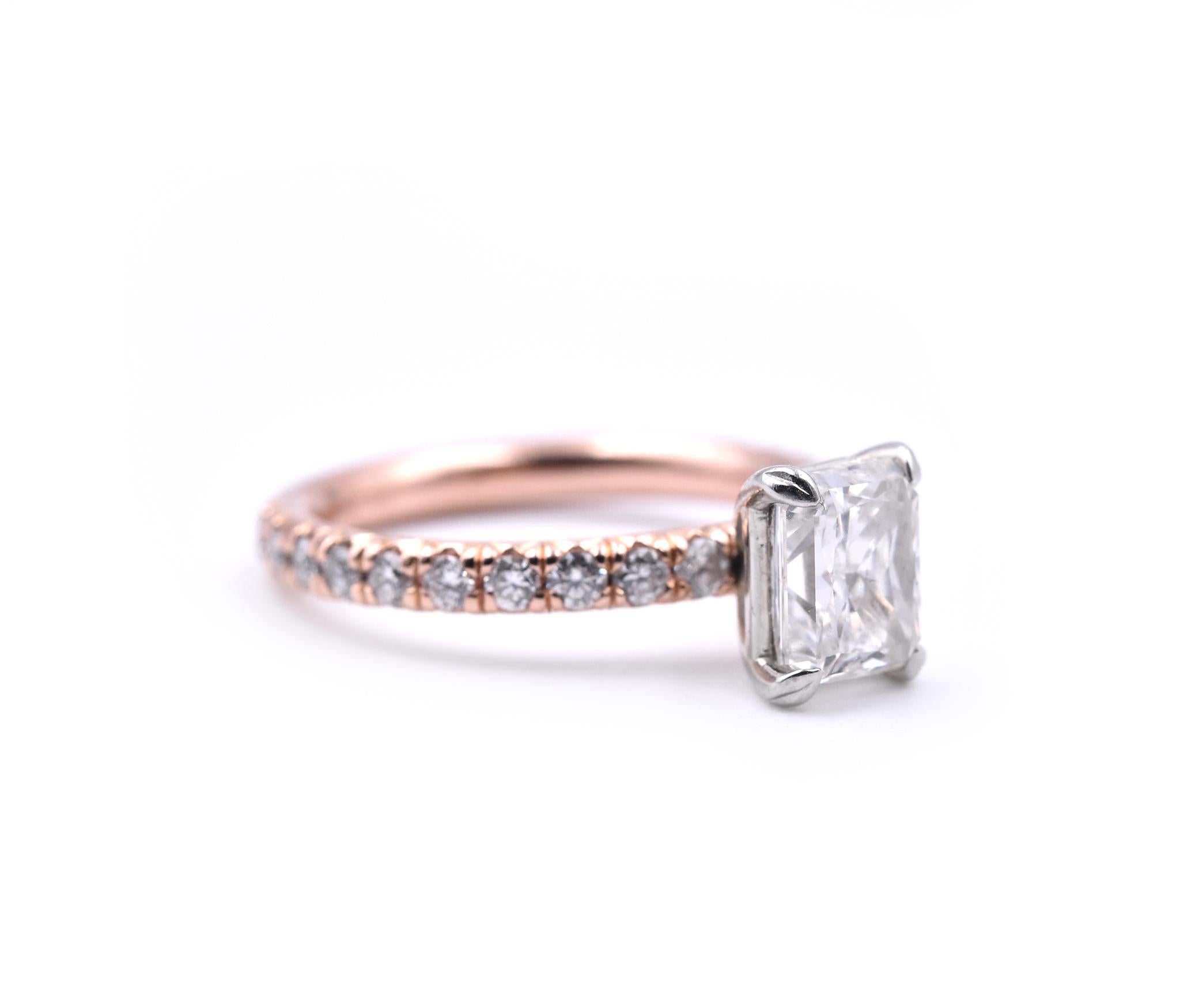 Designer: custom design
Material: 14k rose gold
Center Diamond: 1 Radiant Cut = 1.27ct
Color: H
Clarity: SI1
Cert: GIA 2131609278
Diamonds: 20 Round Brilliant Cuts = .50cttw H SI1
Ring Size: 4.75 (please allow two additional shipping days for sizing