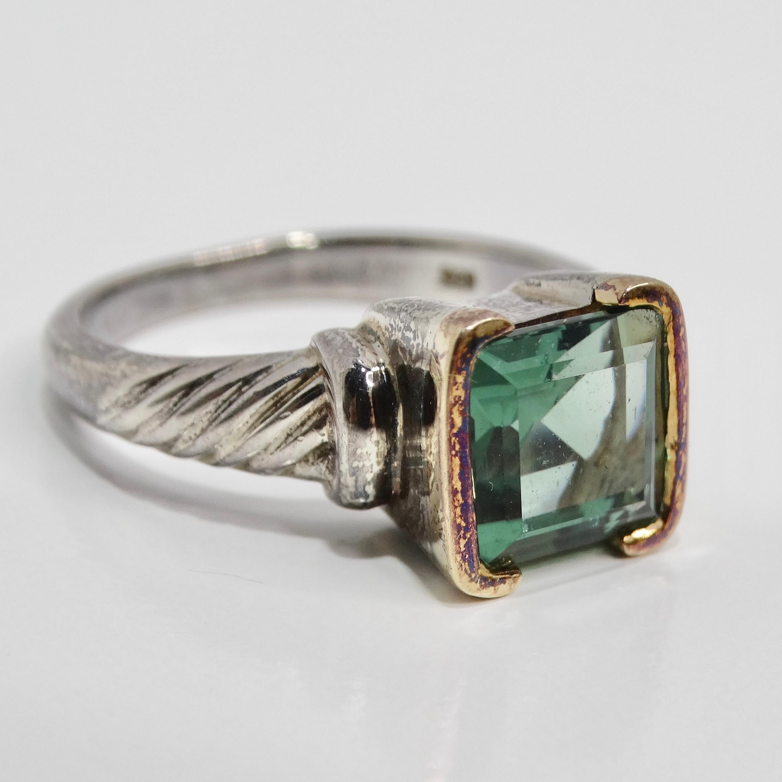 Introducing the 14K Rose Gold 1970s Tourmaline Ring, a stunning vintage cocktail ring that exudes luxury and elegance. This exquisite piece features a beautiful green tourmaline center stone, known for its vibrant hue and captivating sparkle. The