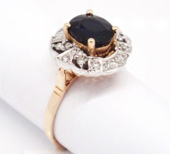 14 Karat Rose Gold 2.4 Karat Oval Sapphire and Diamonds Ring