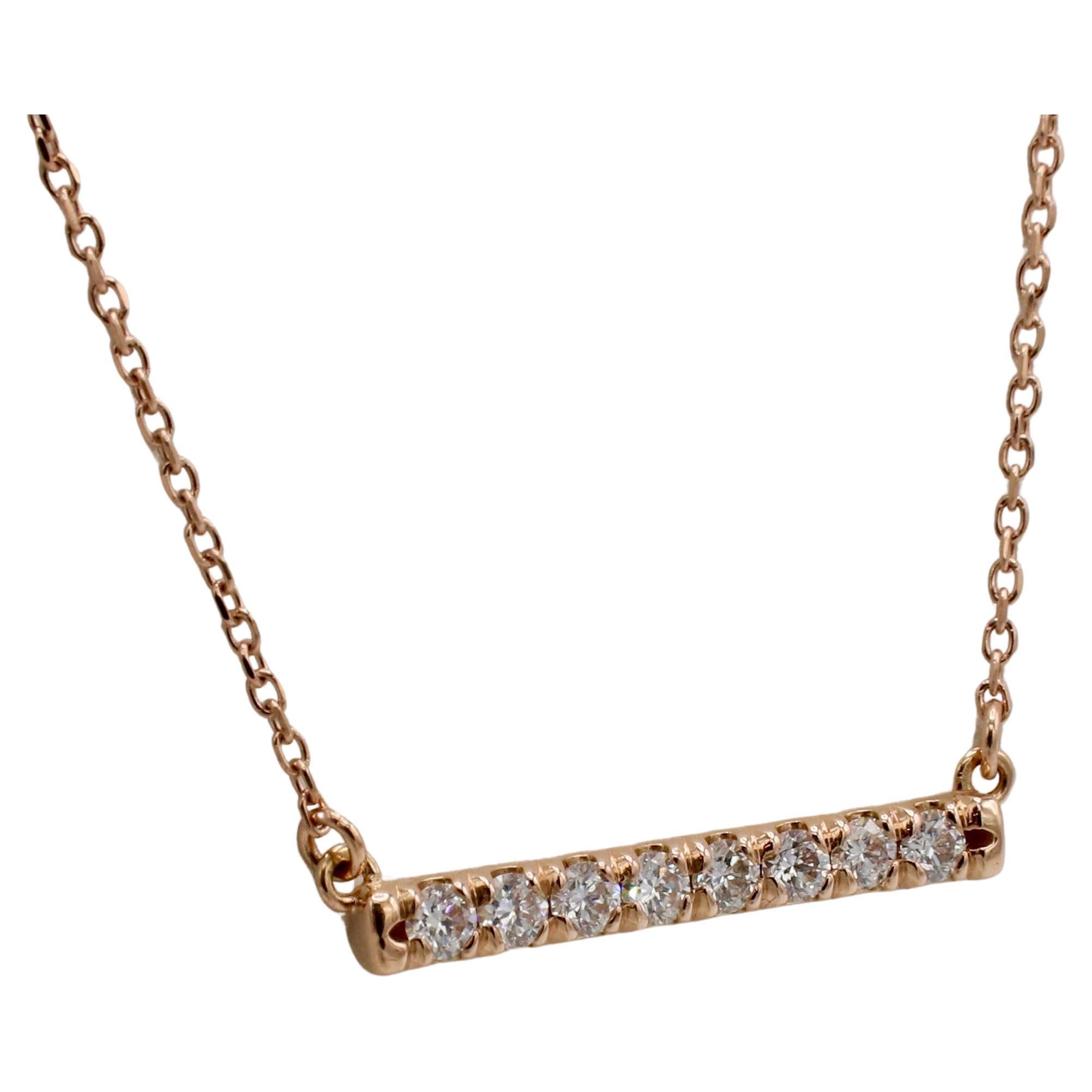 14K Rose Gold .25 Carat Natural Diamond French-Set Bar Necklace
Metal: 14k white gold
Weight: 1.86 grams
Diamonds. 0.25 carats G-H VS round natural diamonds
Bar: 19.5mm
Chain length: 16 inches
Note: Also available in white gold and yellow gold 