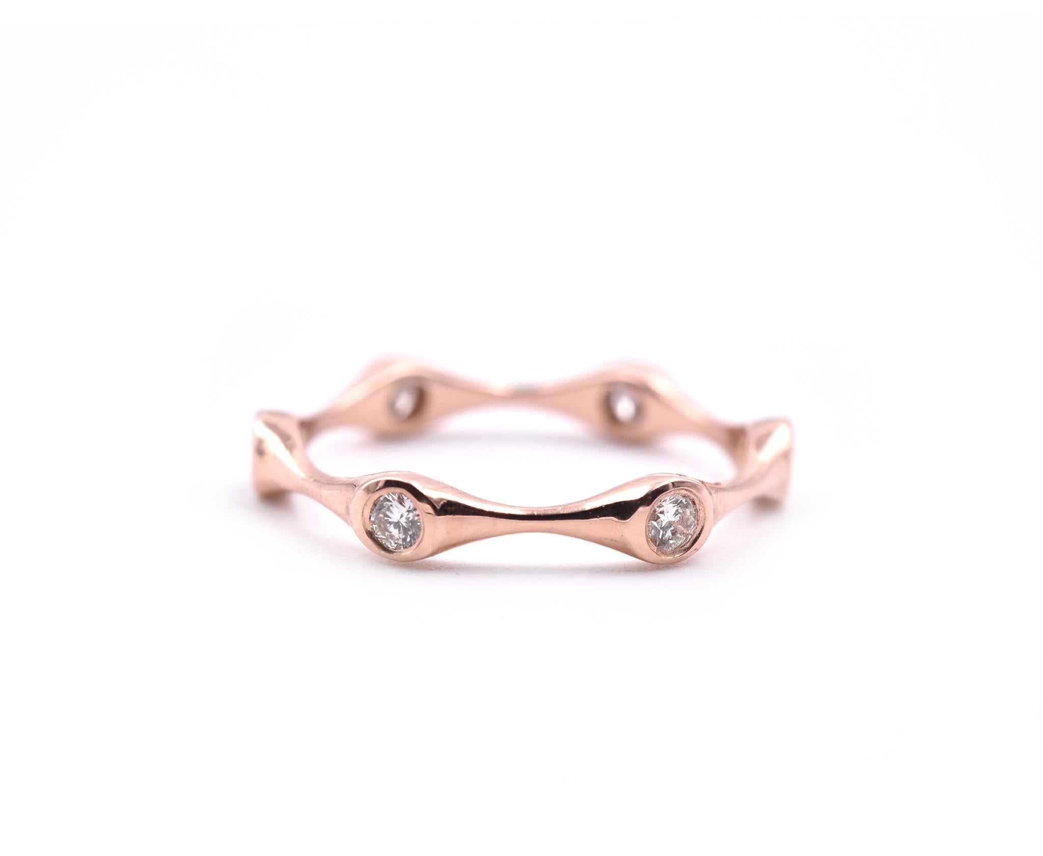 Designer: custom design
Material: 14k rose gold
Diamonds: 6 round brilliant cut= .27cttw
Color: G
Clarity: VS
Size: 6.75 (please allow two additional shipping days for sizing requests)
Dimensions: ring is 3.25mm wide
Weight: 1.67 grams
