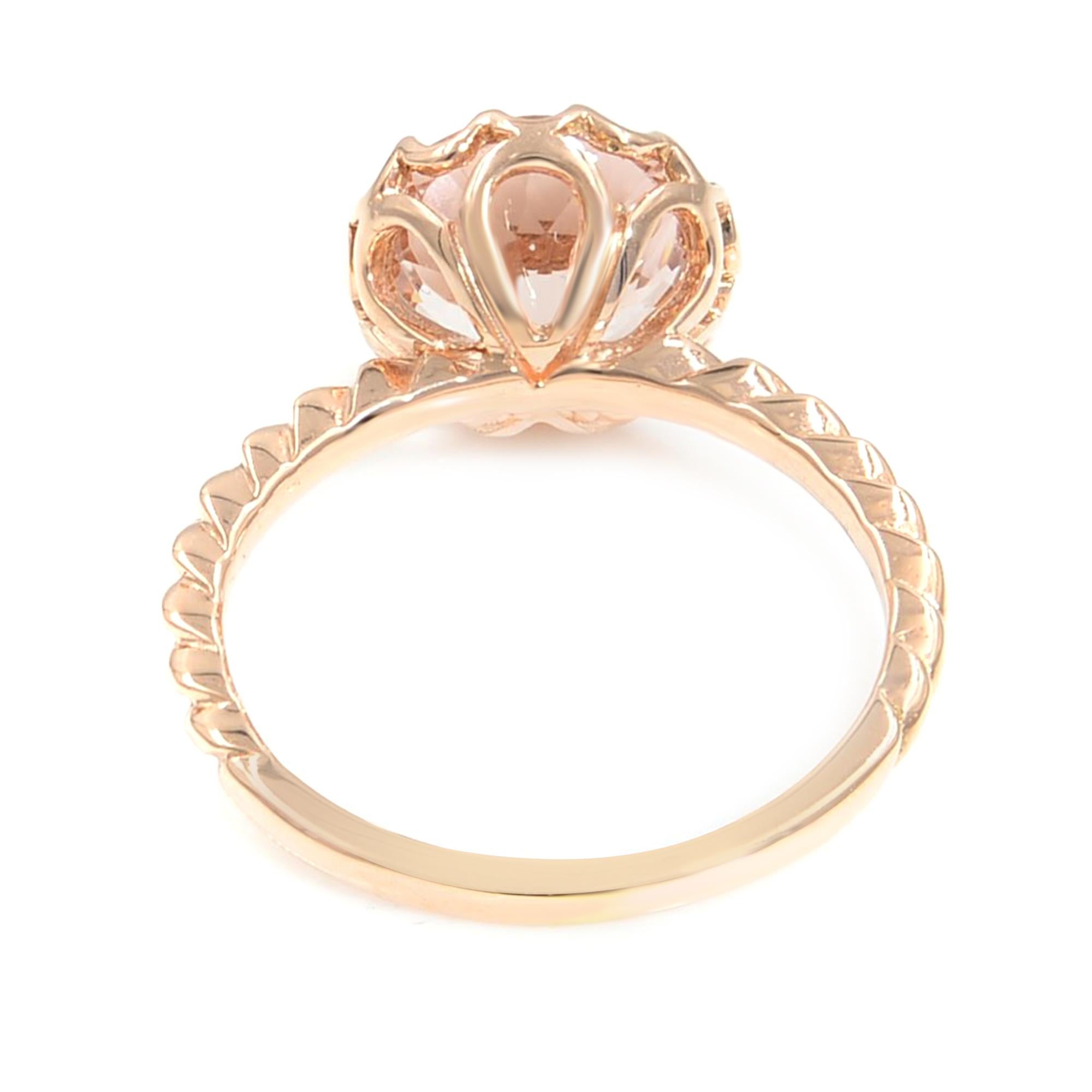 This beautiful solid 14k rose gold light pink/peach Morganite ring is simply gorgeous. The light color of the peach complements the rose gold perfectly. 
Condition: New
Morganite.....................8.5mm approx 
Quality..........................