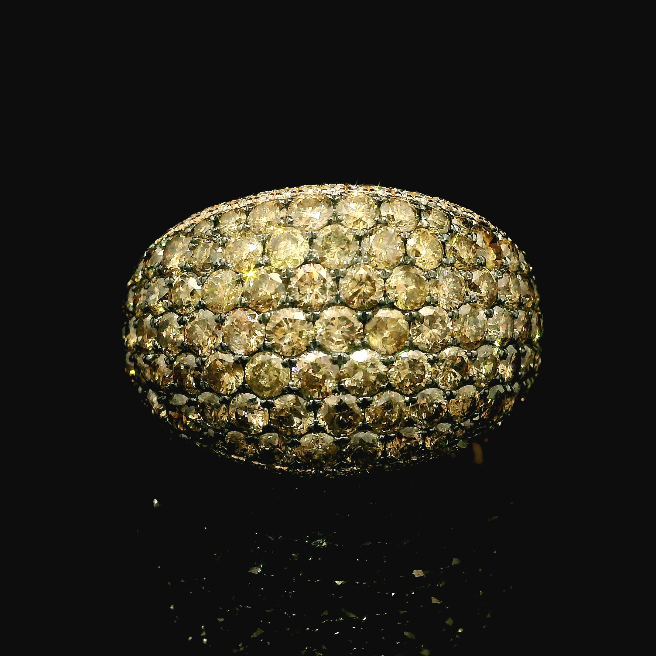 --Stone(s):--
Numerous Natural Genuine Diamonds - Round Brilliant Cut - Pave Set - SI1-I2 Clarity - Fancy Champagne Color - 3ctw (approx.)
Numerous Natural Genuine Diamonds - Round Brilliant Cut - Pave Set - White Color - on Borders - 0.30ctw