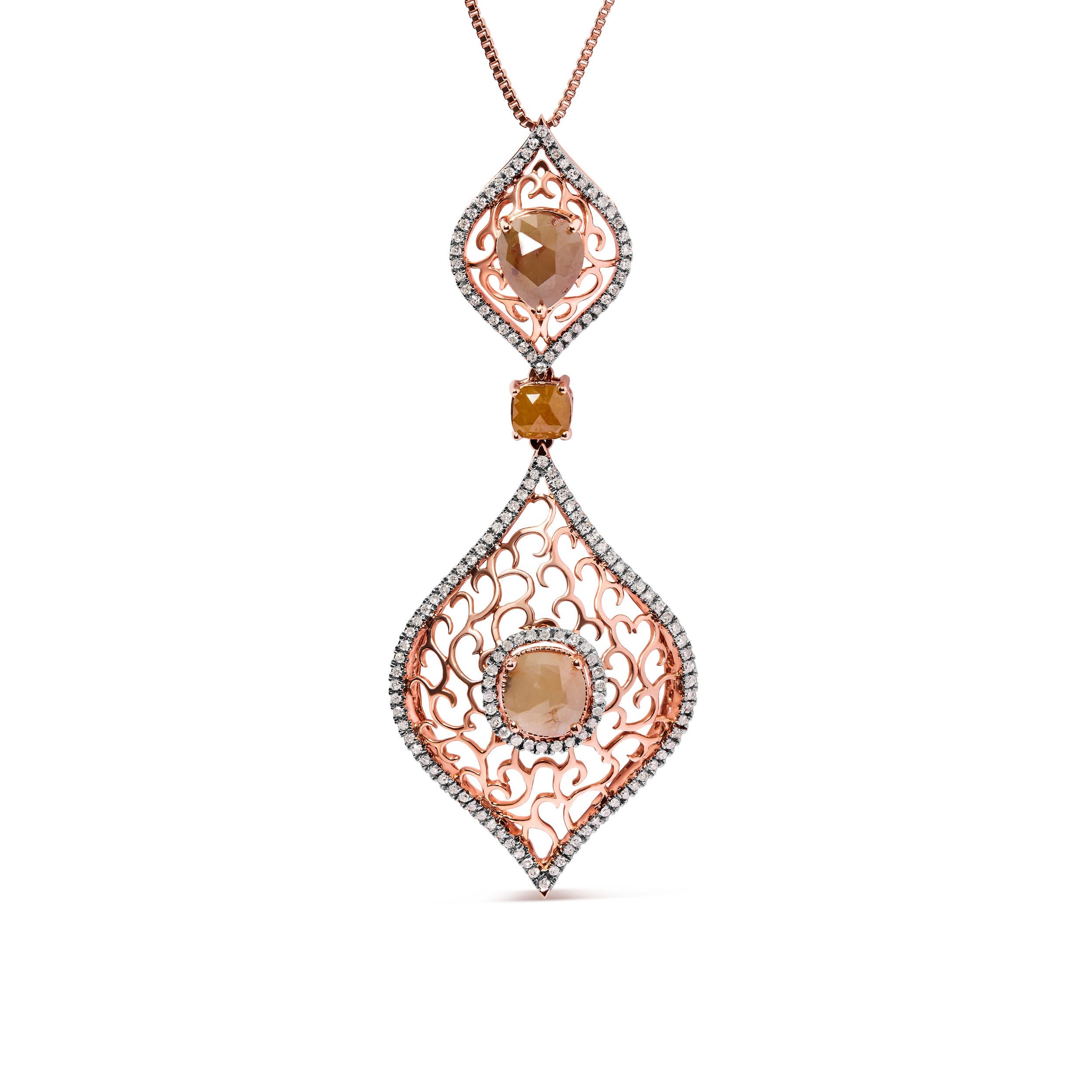 Introducing a breathtaking piece that captures the essence of nature's enchanting beauty. Crafted with exquisite 14K rose gold, this pendant necklace showcases a mesmerizing double rhombus leaf design adorned with a stunning array of diamonds. With