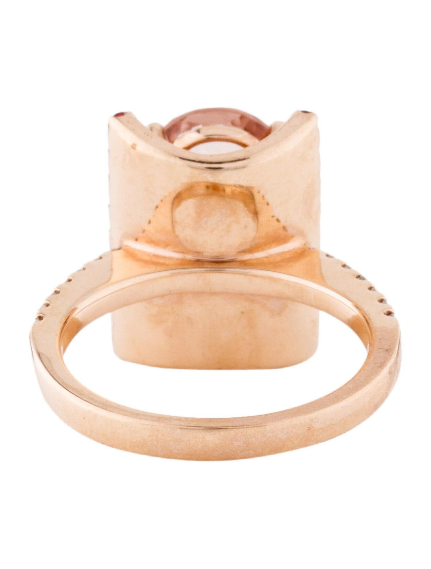 This is a Victorian-age looking oval-shaped natural morganite , sapphire & diamond cocktail ring set in solid 14K rose gold. This ring features a humongous natural oval morganite stone with excellent clear color (AAA quality gem) surrounded on two