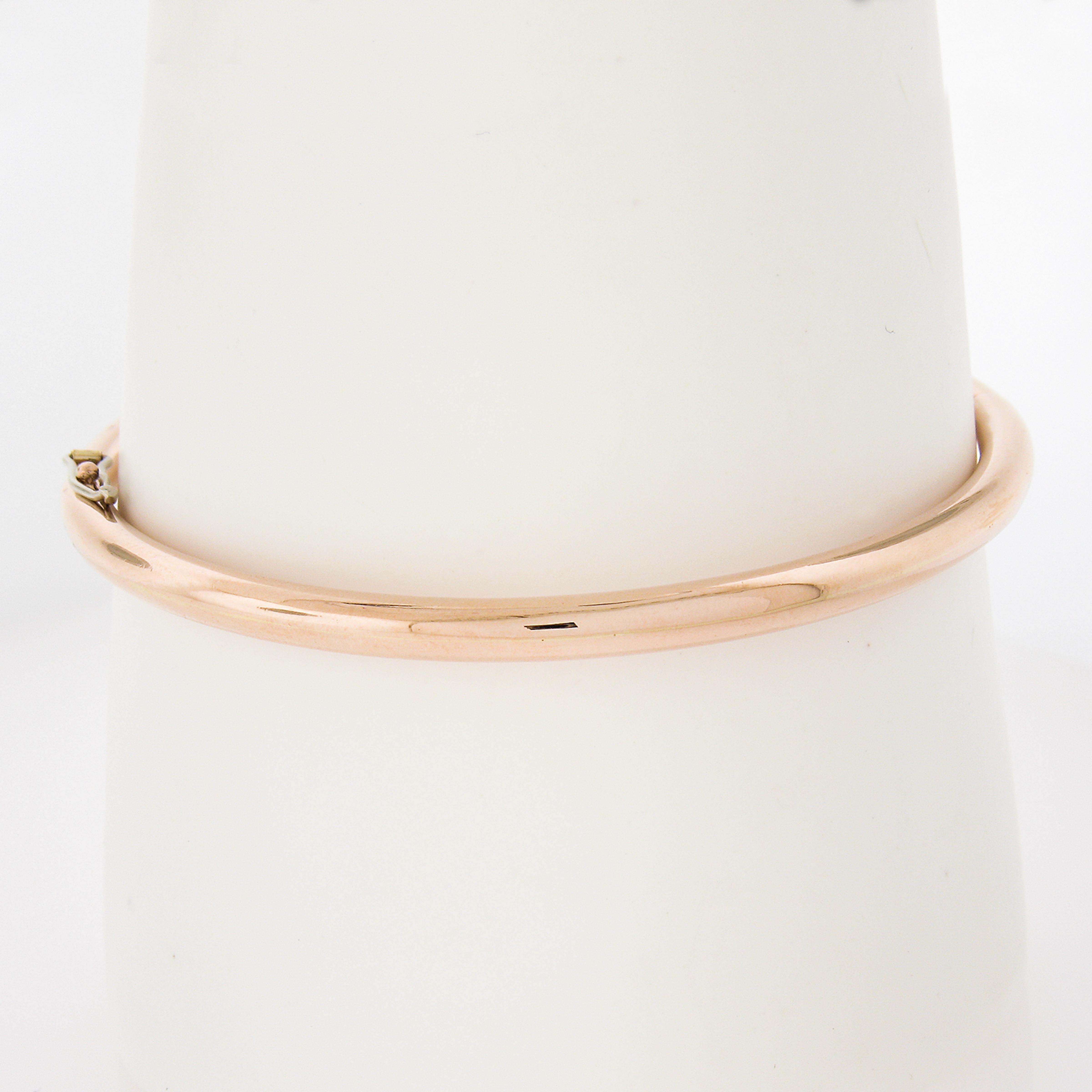 Material: Solid 14K Rose Gold
Weight: 20.10 Grams
Type: Hinged Open Bangle Bracelet
Length: Will comfortably fit up to a 7.25 inch wrist (Fitted on a wrist)
Clasp: Push Clasp w/ Safety Latch
Width: 3.7mm 
Thickness: 3.6mm rise off the