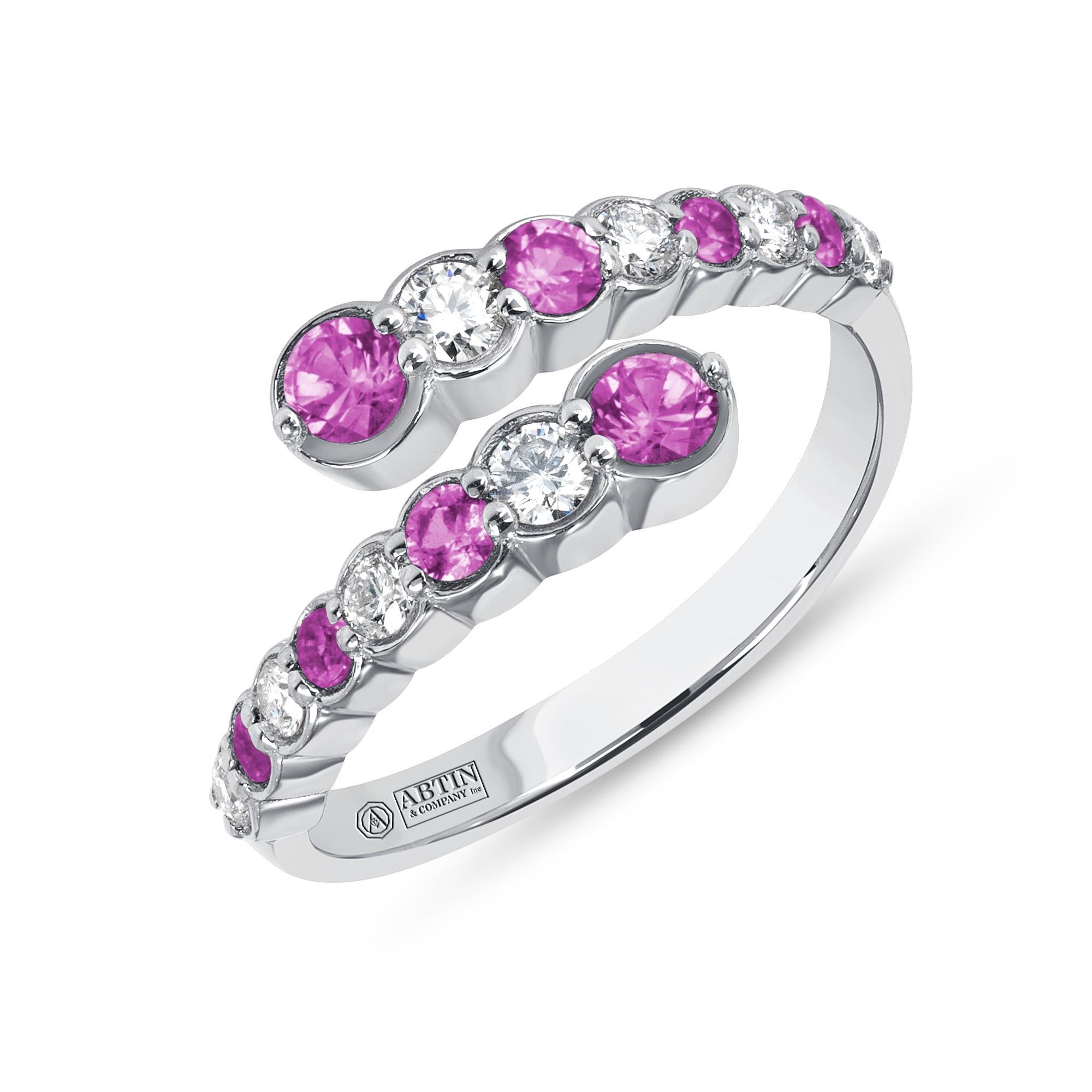 Crafted in 14K gold this ring features a clean and contemporary design. This modern and stylish open bypass alternating ring is set with mesmerizing round-cut diamonds and genuine amethyst gemstones. Stack it with your stacking rings or wear it solo