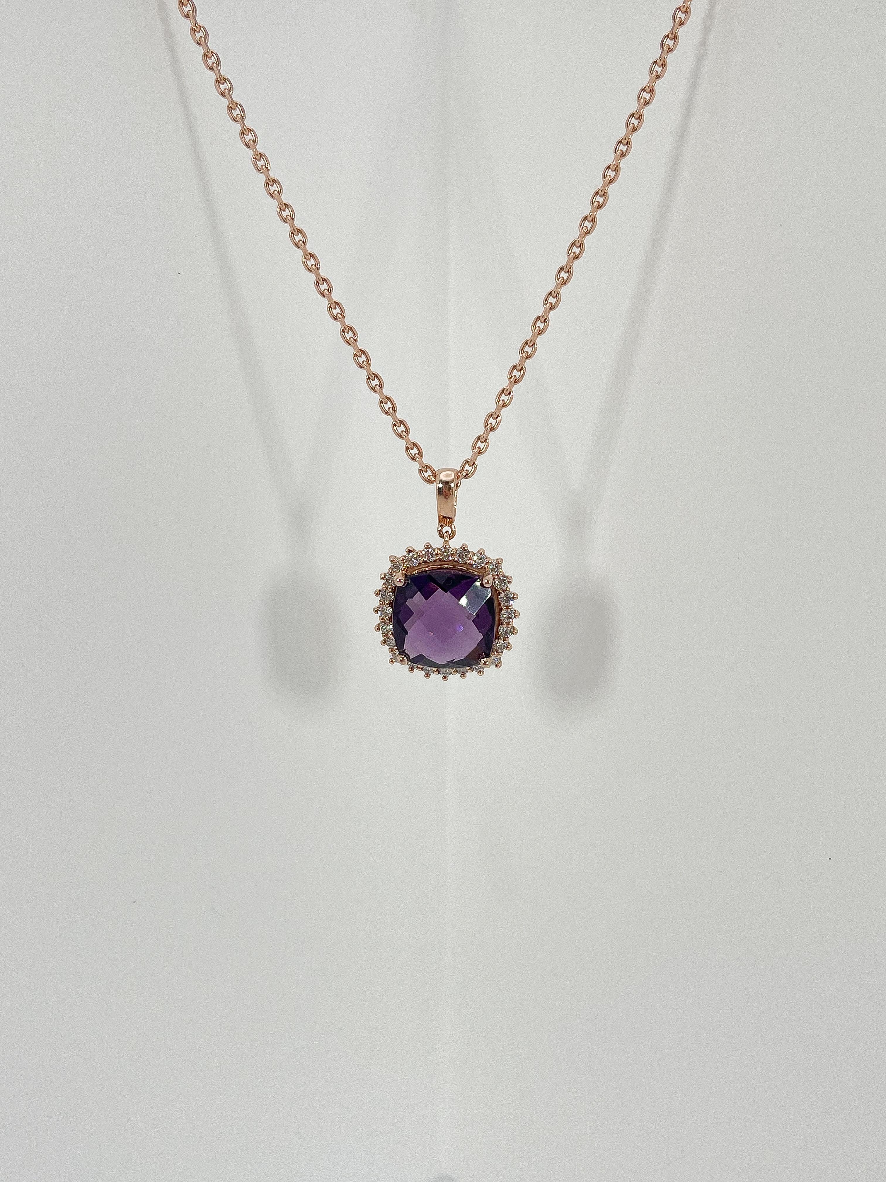 14k rose gold Amethyst and .60 CTW diamond halo pendant necklace. The Amethyst is cushion cut, measures to be 13mm x 13mm, the diamonds in the halo are all round, pendant comes on an 18 inch diamond cut cable chain with a lobster clasp to open and