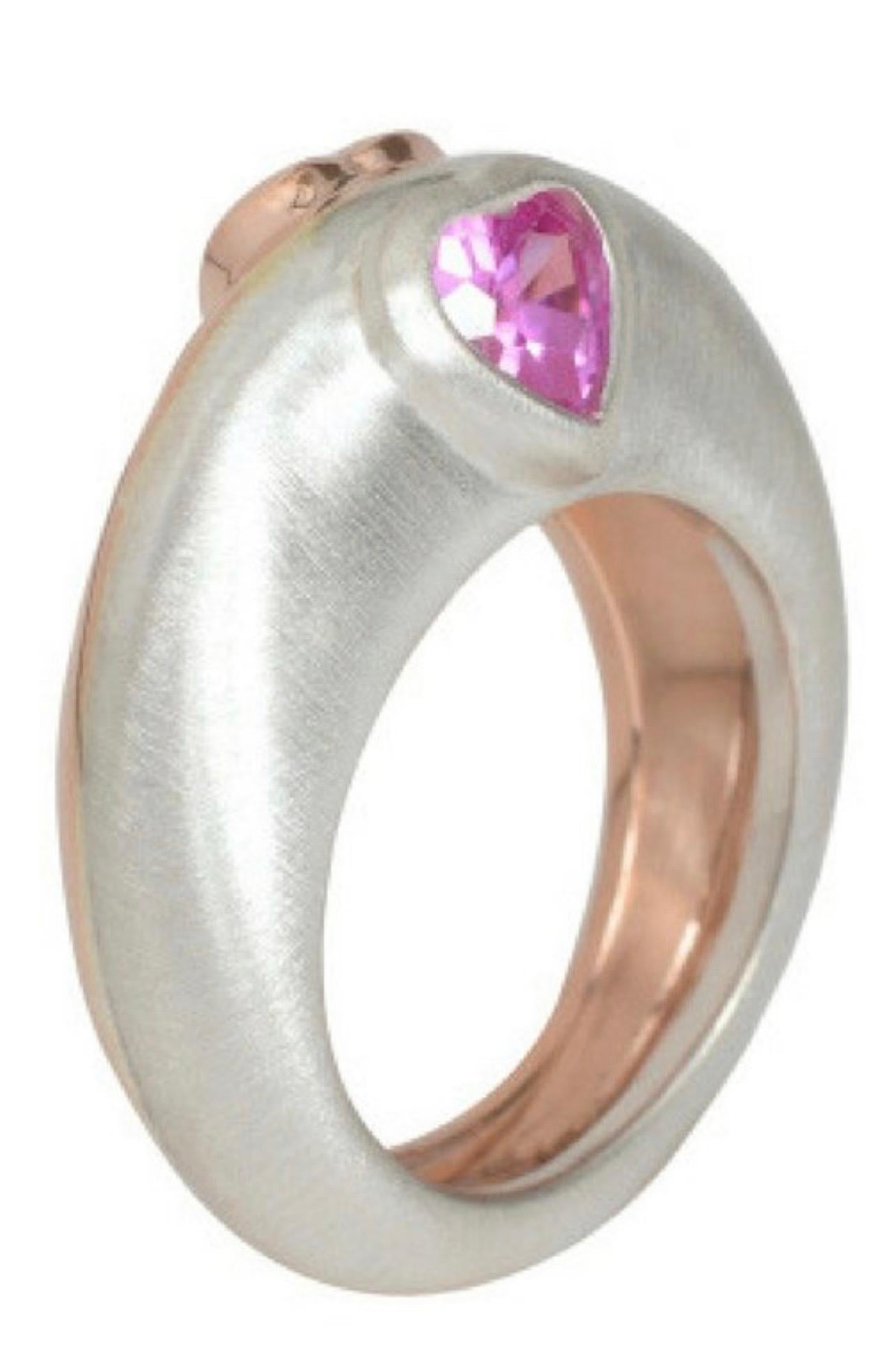 14k Pink Gold and Silver Ring with two sapphire hearts approximate 1 tct. Handset gems

Cost as Shown - Available:
Silver and 14k or 18k Yellow, White, or Pink Gold
3-5 Week Delivery