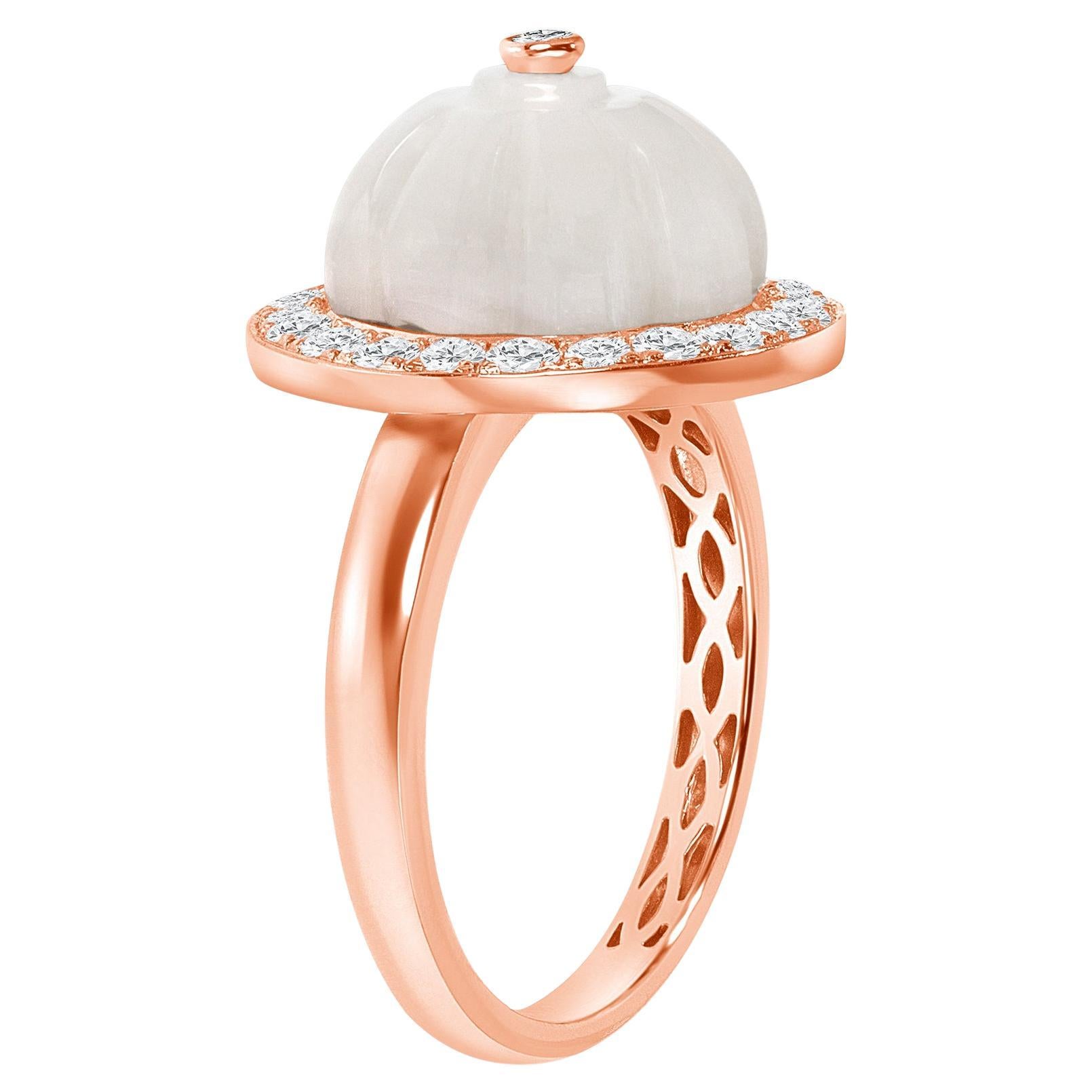 Step into sophistication with this unique ring, meticulously fashioned in luxurious 14k gold, showcasing a mesmerizing mother-of-pearl gemstone encircled by shimmering diamonds. Its exquisite design exudes elegance and style, making it the perfect