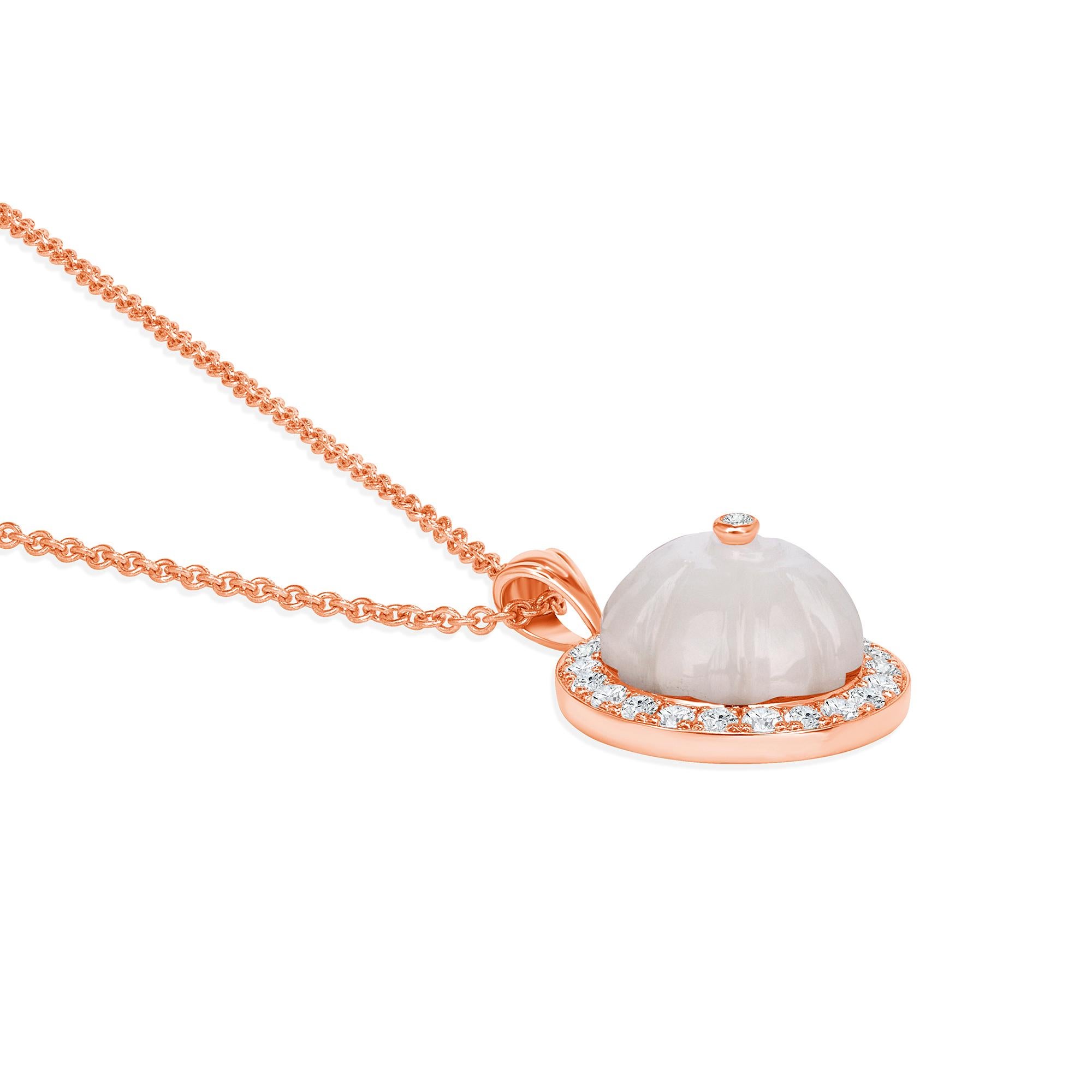 Indulge in the timeless allure of this pendant, expertly crafted in 14k gold and adorned with captivating mother-of-pearl stone and sparkling diamonds. Radiating elegance and charm, this pendant complements any outfit, seamlessly transitioning from