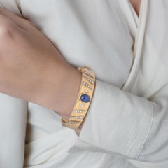 Pulsera brazalete de zafiro y diamantes firmada por Backrach en oro rosa de 14 quilates