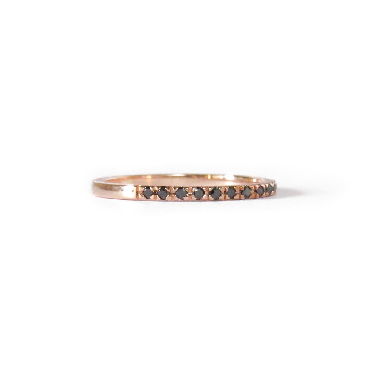MADE TO ORDER *Please note that we take 30 business days to create your jewel before its ready to ship. 

A 14K rose gold unique anniversary band that contains black diamonds. 

Gemstones: Genuine Black Diamonds (0.15 total carat weight)
* these