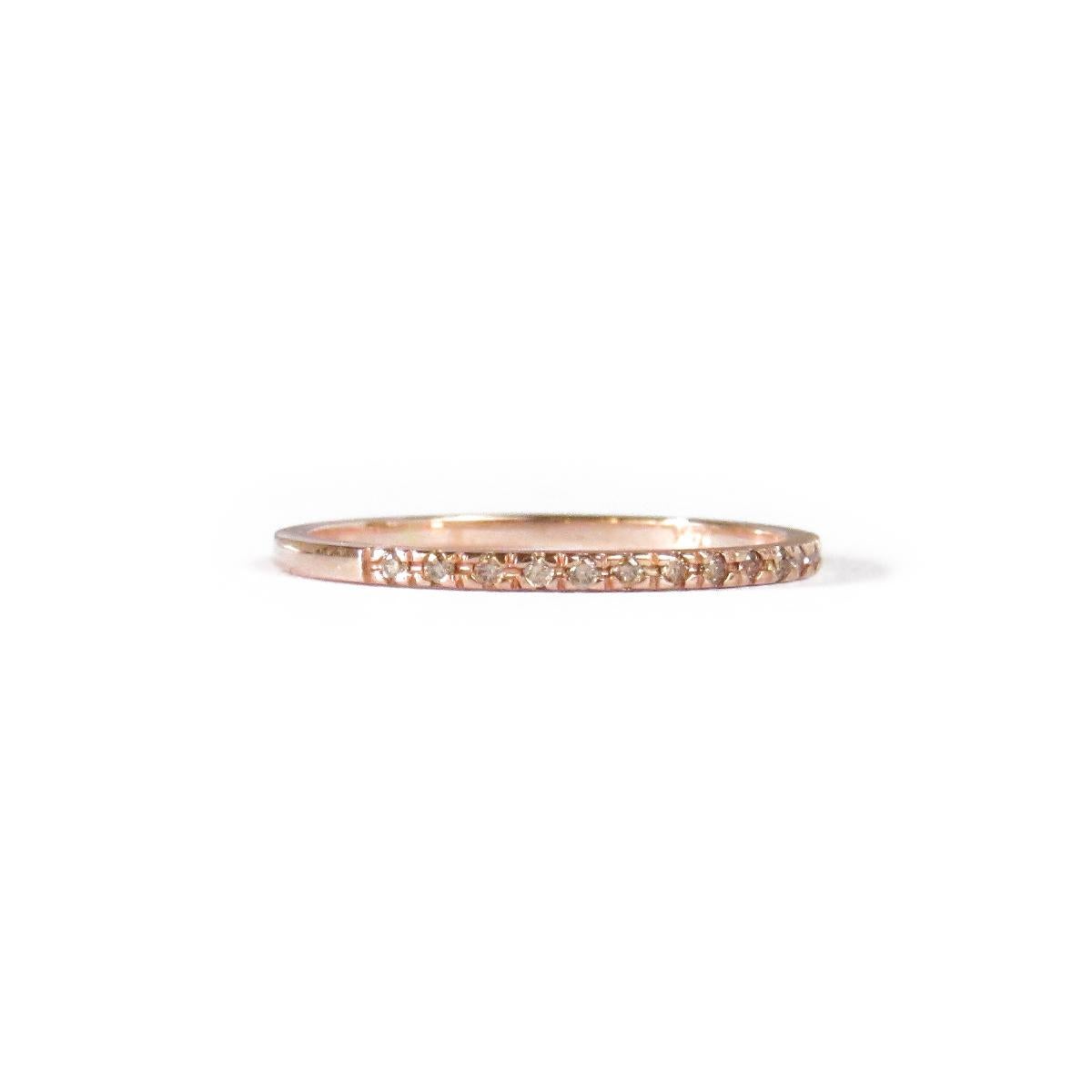 MADE TO ORDER *Please note that we take 30 business days to create your jewel before its ready to ship. 

A 14K rose gold unique anniversary band that contains champagne diamonds. 

Gemstone: 
Diamonds
Total Carat Weight: 0.09 ct
Color: