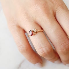 14 Karat Rose Gold Cluster Garnet, Colorless Topaz, and Smoky Quartz Ring
