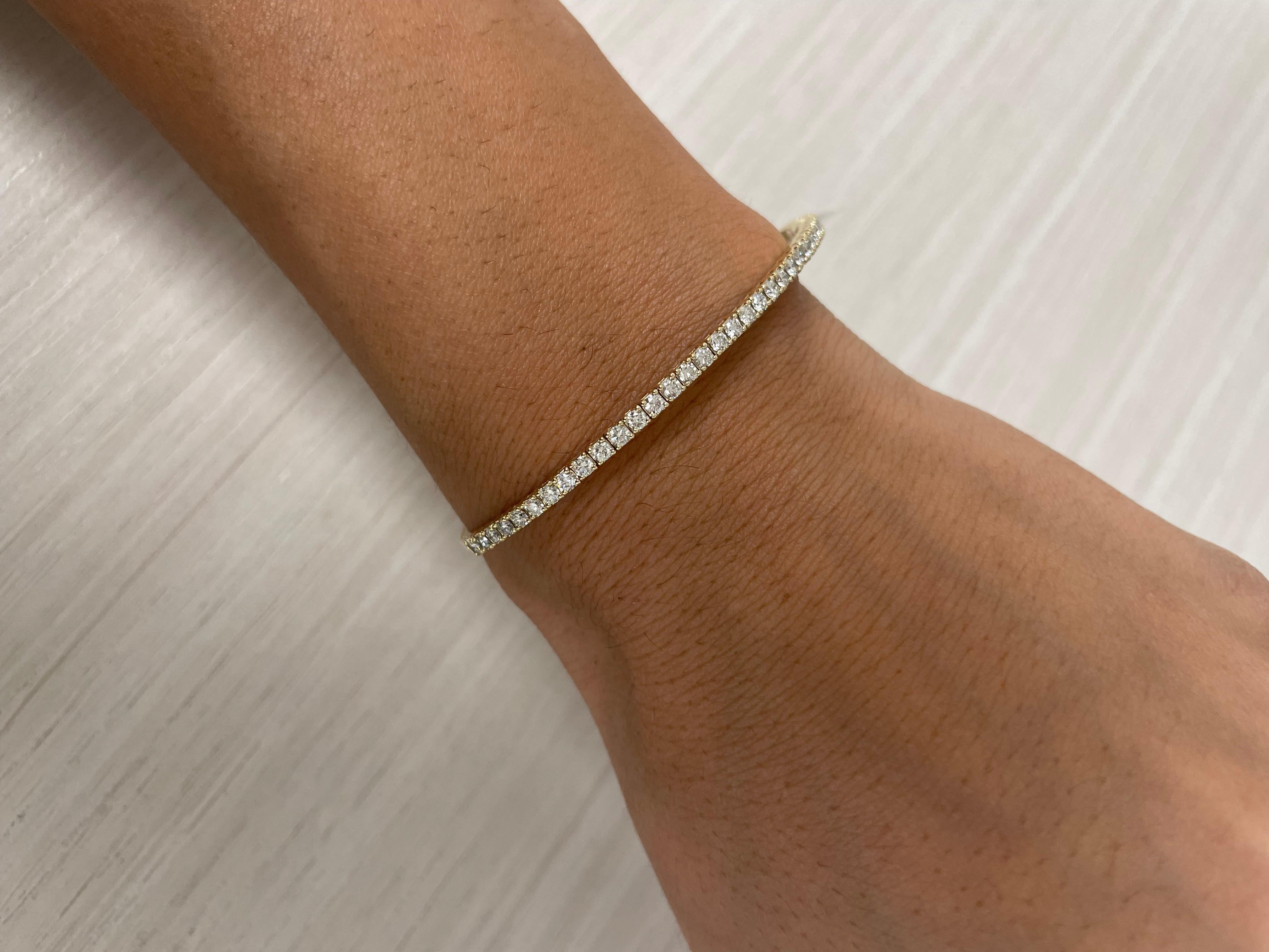 Quality Stackable Bangle: Made from real 14k gold and 37 glittering white approximately 1.49 ct. Certified diamonds, featuring a single row of white diamonds flexible diameter for comfort with a color and clarity of GH-SI
 Surprise Your Loved One