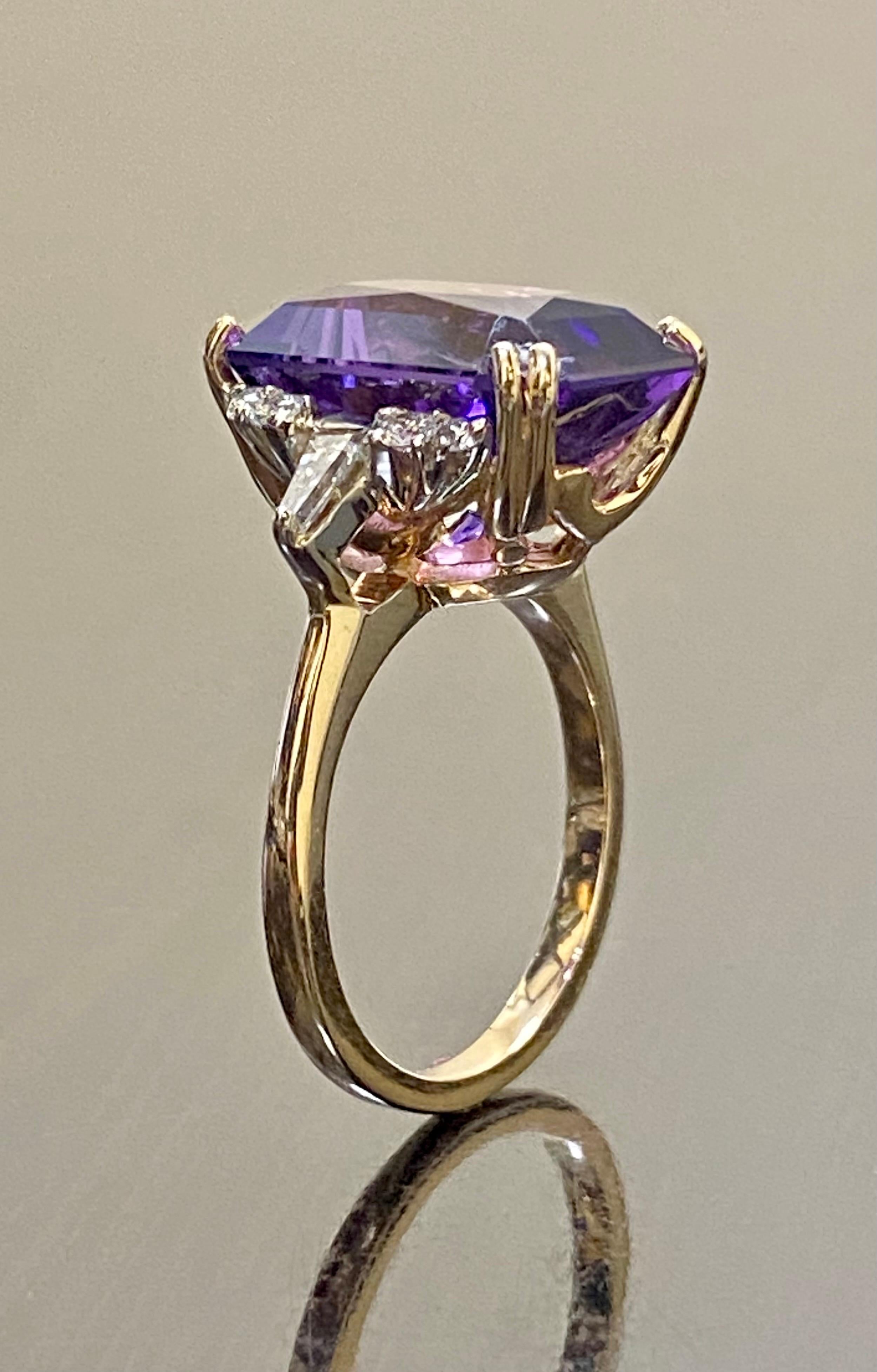 DeKara Designs Collection

Metal- 14K Rose Gold, .583.

Stones- Natural Radiant Cut Amethyst 9.12 Carats, 2 Tapered Baguettes, 8 Round Diamonds G-H Color VS2 Clarity, 0.35 Carats.

Size- 6 3/4. FREE SIZING!!!!

Beautiful Handmade Art Deco Inspired