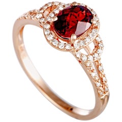 14 Karat Rose Gold Diamond and Garnet Oval Ring