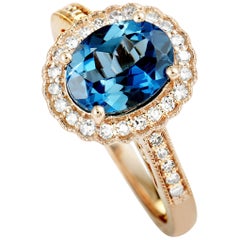 14 Karat Rose Gold Diamond and London Topaz Oval Ring