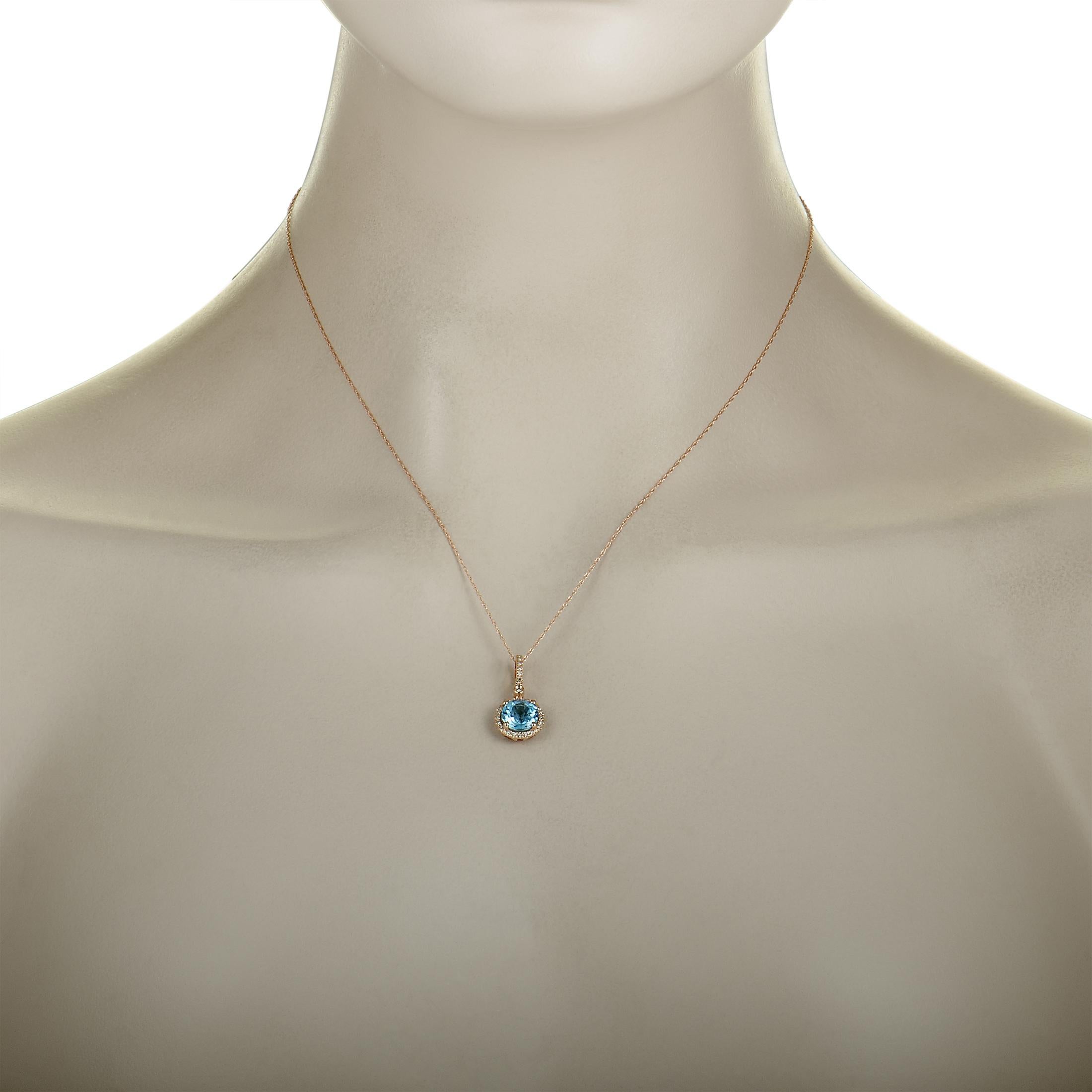 This necklace is made of 14K rose gold and set with a topaz and a total of 0.11 carats of diamonds. It has an 18.00” long chain with spring ring closure, while the pendant measures 0.87” in length and 0.40” in width. The necklace weighs 2.2 grams.
