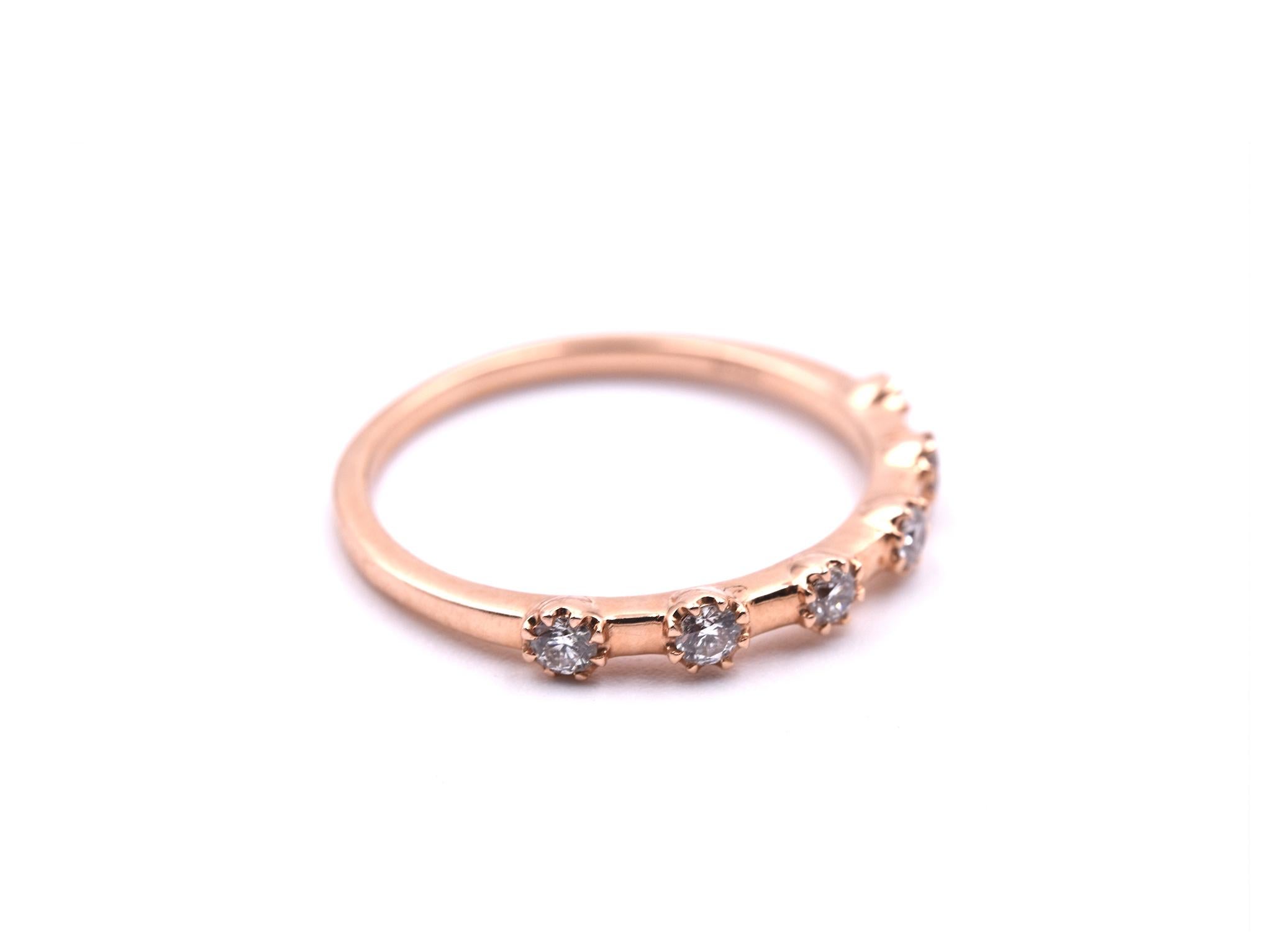 Designer: custom design
Material: 14k rose gold
Diamonds: 6 round brilliant cut = .25cttw
Color: G
Clarity: VS
Ring size: 6 ½ (please allow two additional shipping days for sizing requests)
Dimensions: ring is approximately 2.61mm wide
Weight: 1.66