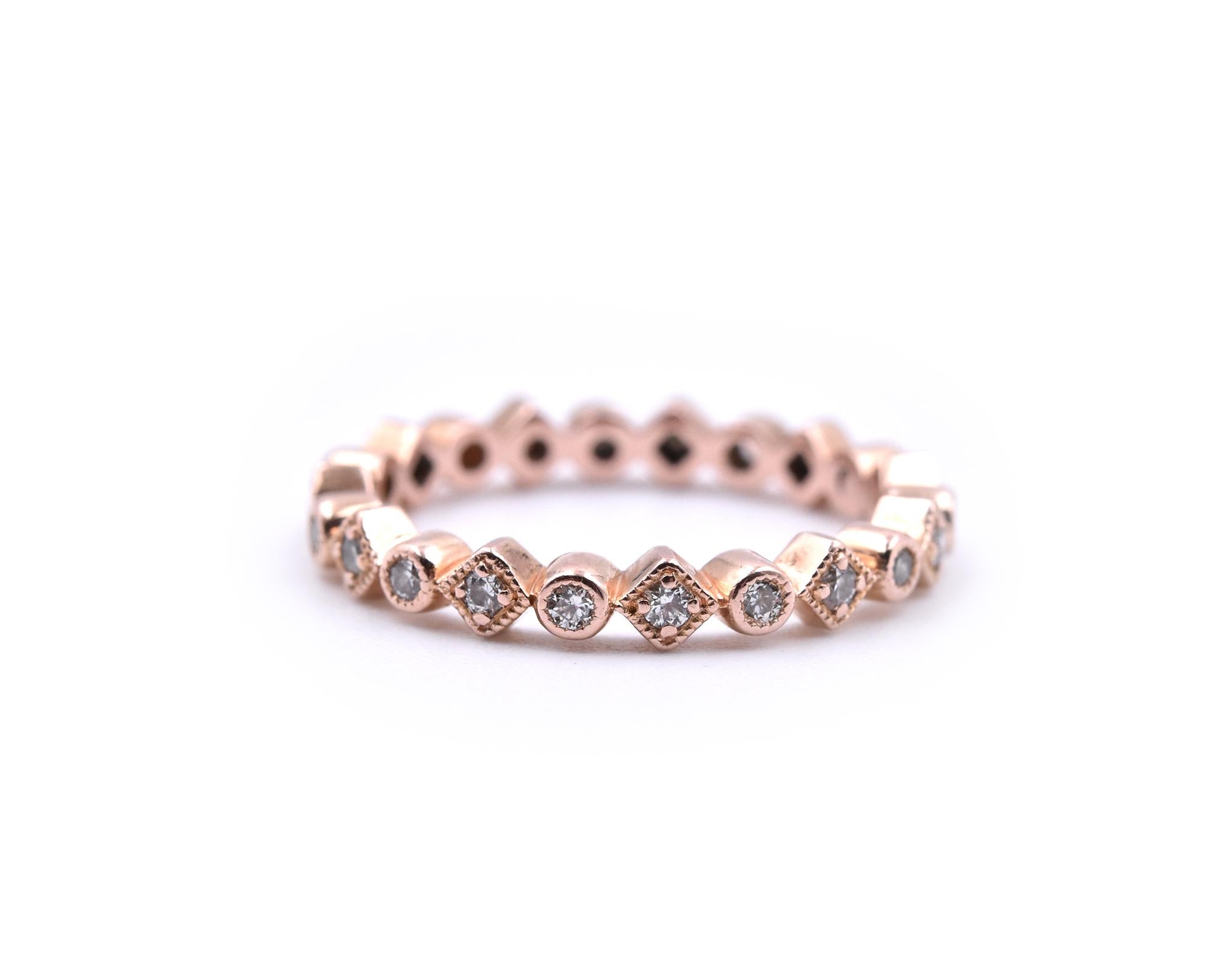 Designer: custom design
Material: 14K Rose Gold
Diamonds: 22 Round Brilliants = .30cttw
Color: H
Clarity: SI1
Size: 5 
Dimensions: Ring is 2.78mm wide
Weight: 1.99 Grams
