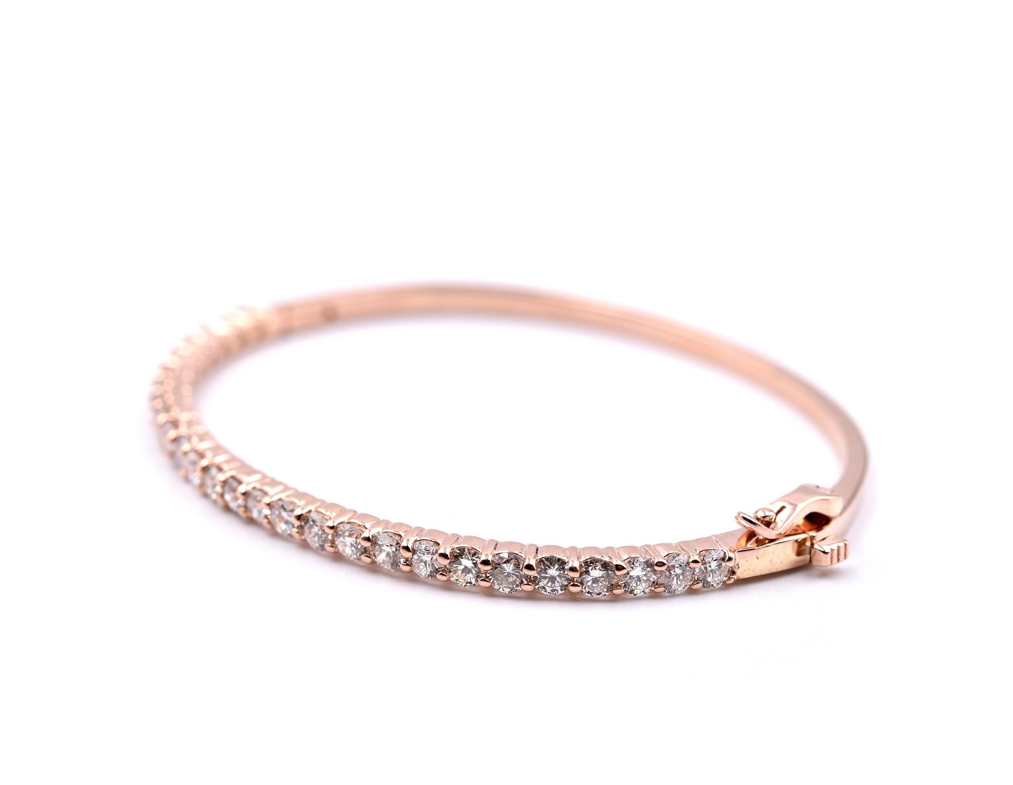 Designer: custom designed
Material: 14k rose gold
Diamonds: 27 round brilliant cut= 2.78cttw
Color: G
Clarity: VS
Dimensions: bracelet will fit a 6 ½ inch wrist and it is approximately 3.12mm wide
Weight: 11.20 grams
