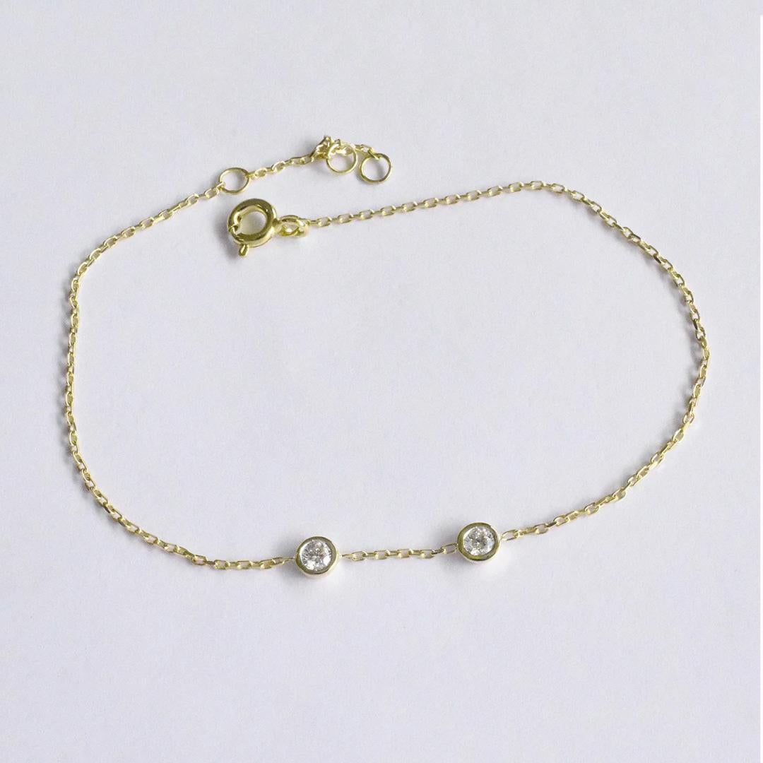 Moderne Bracelet duo de diamants en or 14 carats avec lunette en vente
