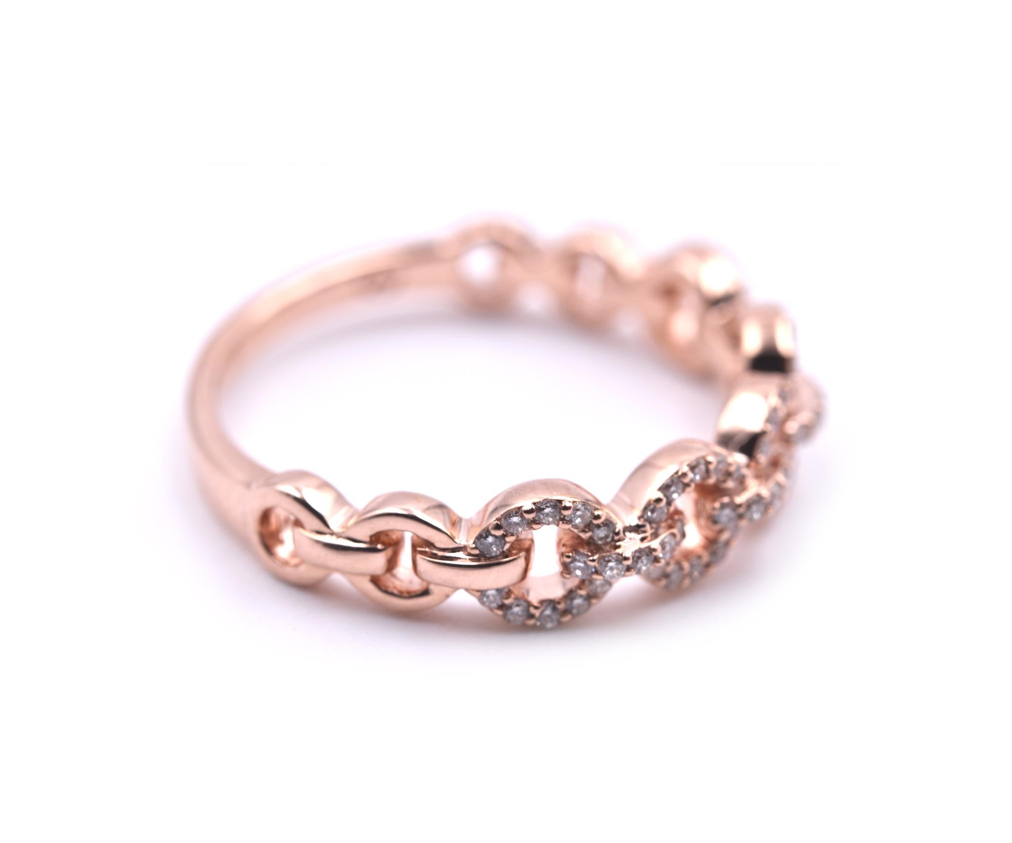 Designer: custom design
Material: 14k rose gold
Diamonds: 70 round brilliant cut = .25cttw
Color: G
Clarity: VS
Ring size: 7 ¼ (please allow two additional shipping days for sizing requests)
Weight: 3.0 grams 
