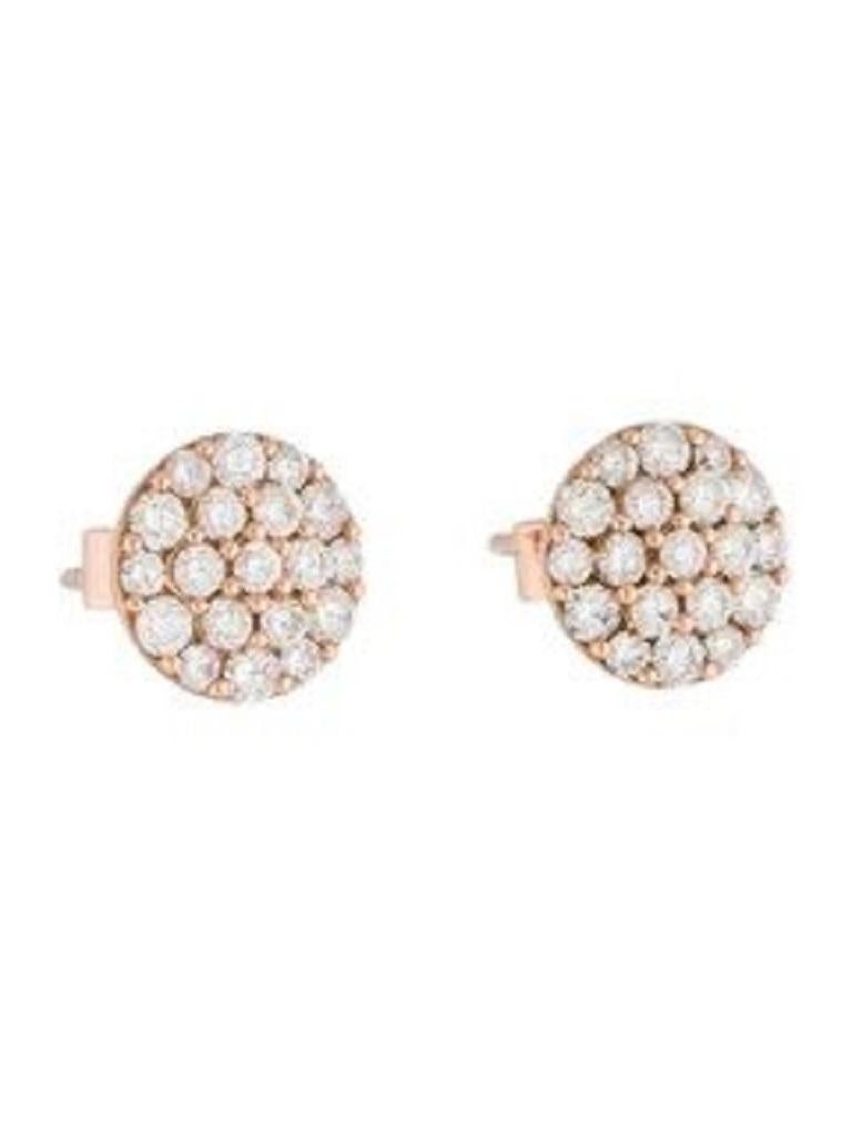 These Beautfiul and Shimmering Diamond Cluster Stud Earrings are crafted of 14K Rose Gold and feature 0.72cts of Round White Diamonds, with butterfly push-back closure.
 
 14K Rose Gold
 0.72cts White Diamonds
 Shape Round
 Color GH
 Clarity SI1

