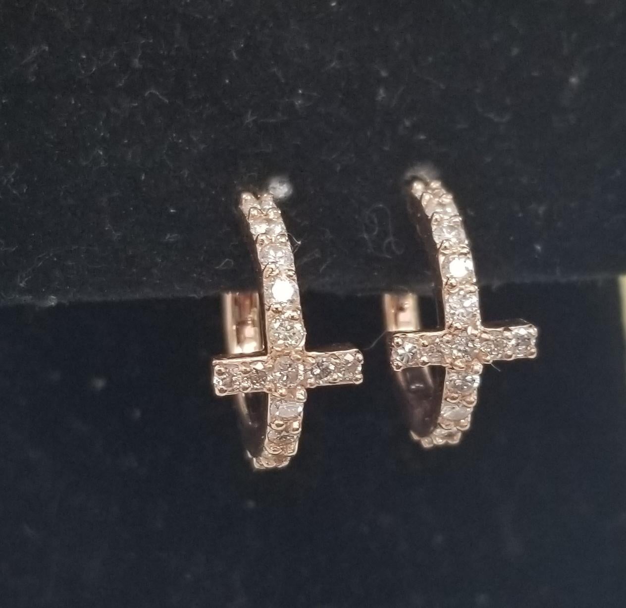 14k rose gold diamond cross hoop earrings containing 30 round full cut diamonds; color G, clarity SI1-2 and weight .70pts.,  
*This could be made in 14k white, yellow or rose gold*