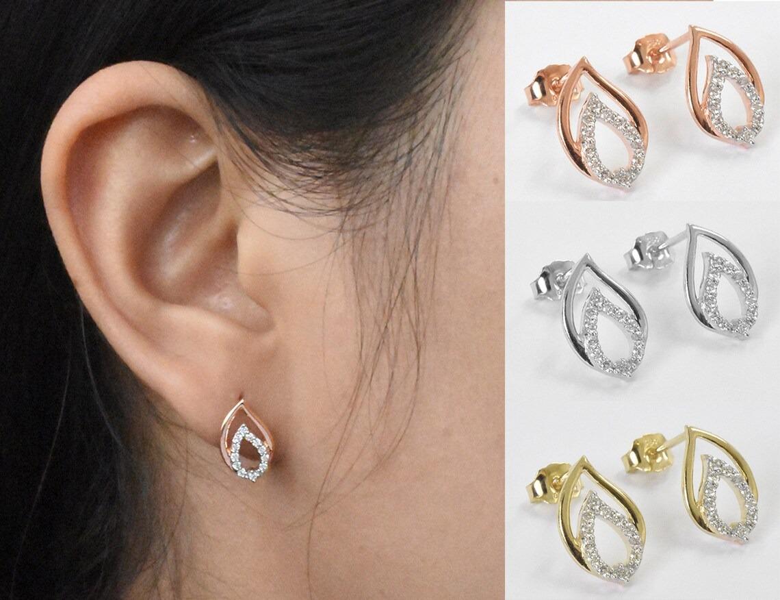 Diamond Pear Halo Earrings in 14k Rose Gold, Yellow Gold, White Gold.

These Dainty Stud Earrings are made of 14k solid gold featuring shiny brilliant round cut natural diamonds set by master setter in our studio. Simple but unique, elegant and easy