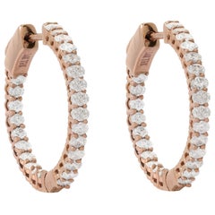 Boucles d'oreilles en or rose 14 carats et diamants