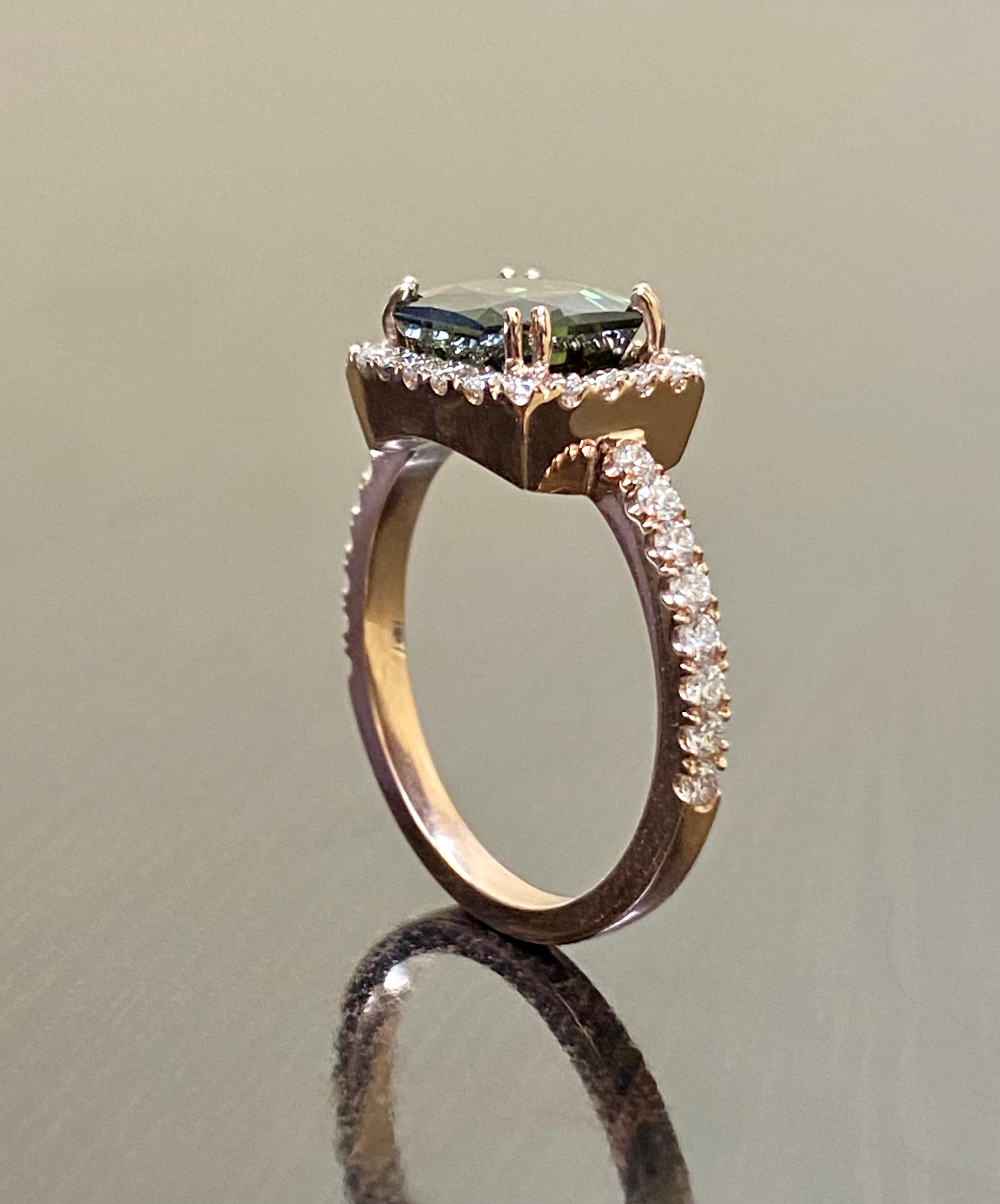 DeKara Designs Collection

Metal- 14K Rose Gold, .583.

Stones- 1 Radiant Cut No Heat Peacock Sapphire 3.66 Carats, 38 Round Diamonds G-H Color VS1-VS2 Clarity 0.52 Carats.  Sapphire is No Heat

Size- 7 1/2. FREE SIZING!!!!

Handmade 14K Rose Gold