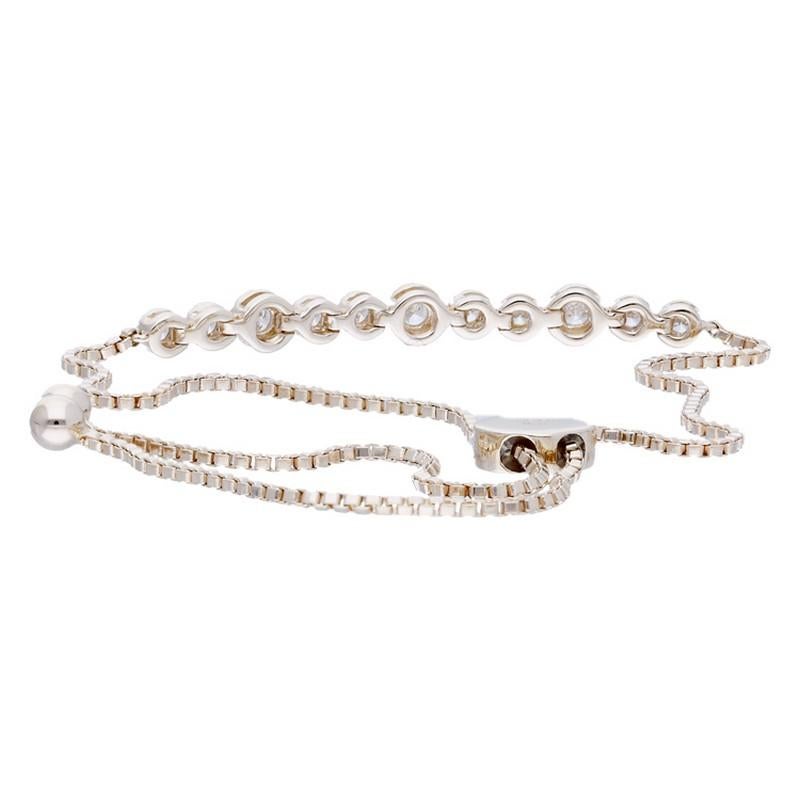 Diamond Carat Weight: This elegant Gazebo Fancy Collection bracelet boasts a total of 0.22 carats of round diamonds. These 11 round diamonds are set in a secure bezel setting, creating a sophisticated and modern look.

Bezel Setting: The diamonds